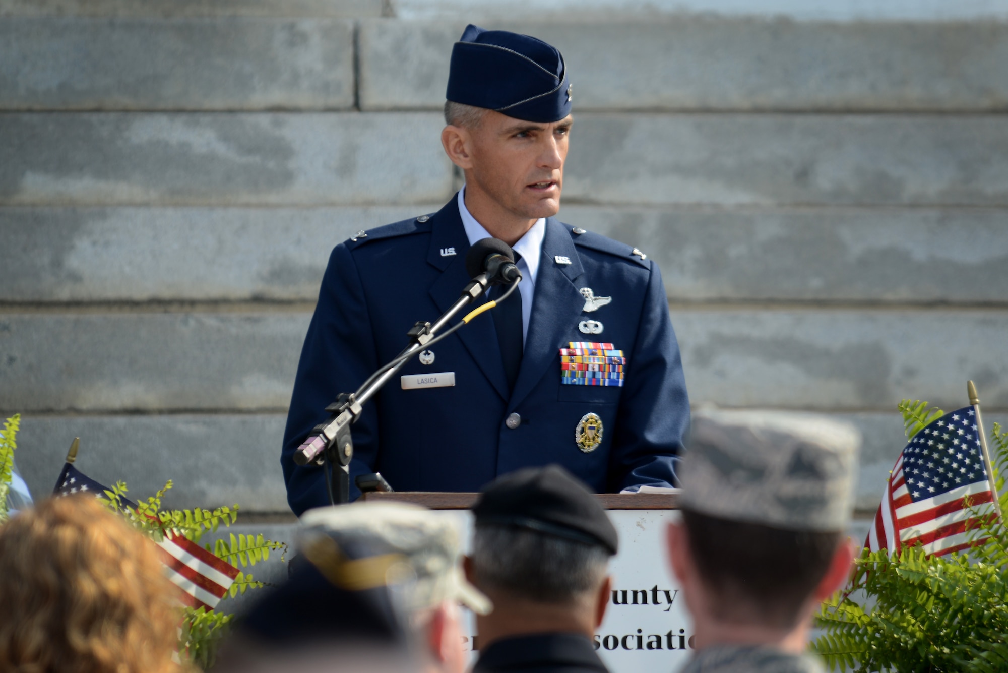 U.S. Air Force Col. Daniel Lasica, 20th Fighter Wing commander, addresses attendees during a Veterans Day ceremony, Sumter, S.C., Nov. 11, 2016. Lasica was the guest speaker for the ceremony held on the front lawn of the Sumter County Courthouse. (U.S. Air Force photo by Airman 1st Class Kelsey Tucker)
