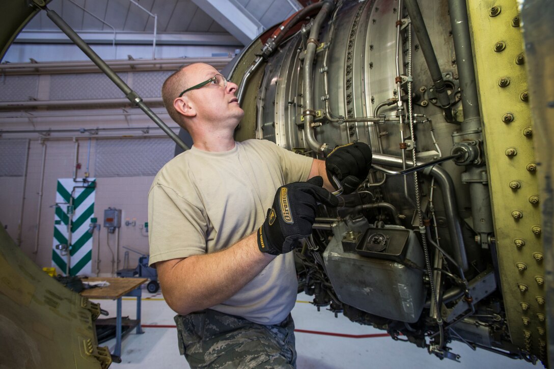 Tech. Sgt. Jeremy Bartram, KC-135R Stratotanker Crew Chief, 108th Wing, New Jersey Air National Guard, opens a fan duct on a CFM-56 turbofan engine at Joint Base McGuire-Dix-Lakehurst, N.J., Nov. 5, 2016. (U.S. Air National Guard photo by Master Sgt. Mark C. Olsen/Released)