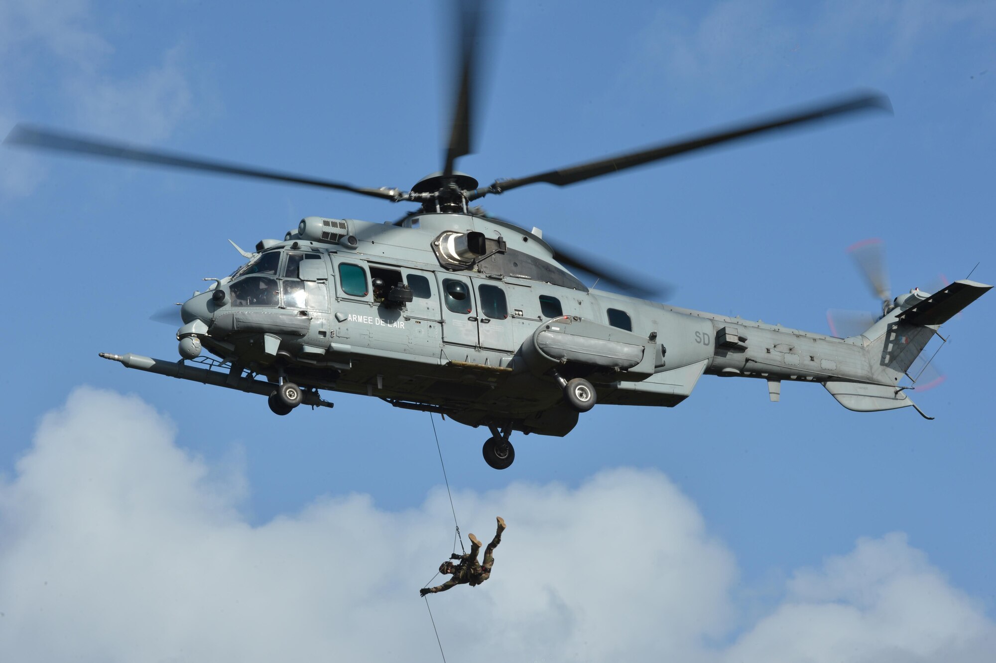 A French commando from parachutiste de l'air no 30 (CPA 30) rappels from a French air force EC-725 Caracal assigned to the 1/67 Pyrénées Squadron, Nov. 9 during Exercise Salamander at Cazaux Air Force Base, France. TThe commandos partnered with U.S. Air Force Guardian Angel team members from the 57th RQS at RAF Lakenheath and members from both units flew in French and U.S. Air Force helicopters during the exercise. (U.S. Air Force photo/Master Sgt. Eric Burks)