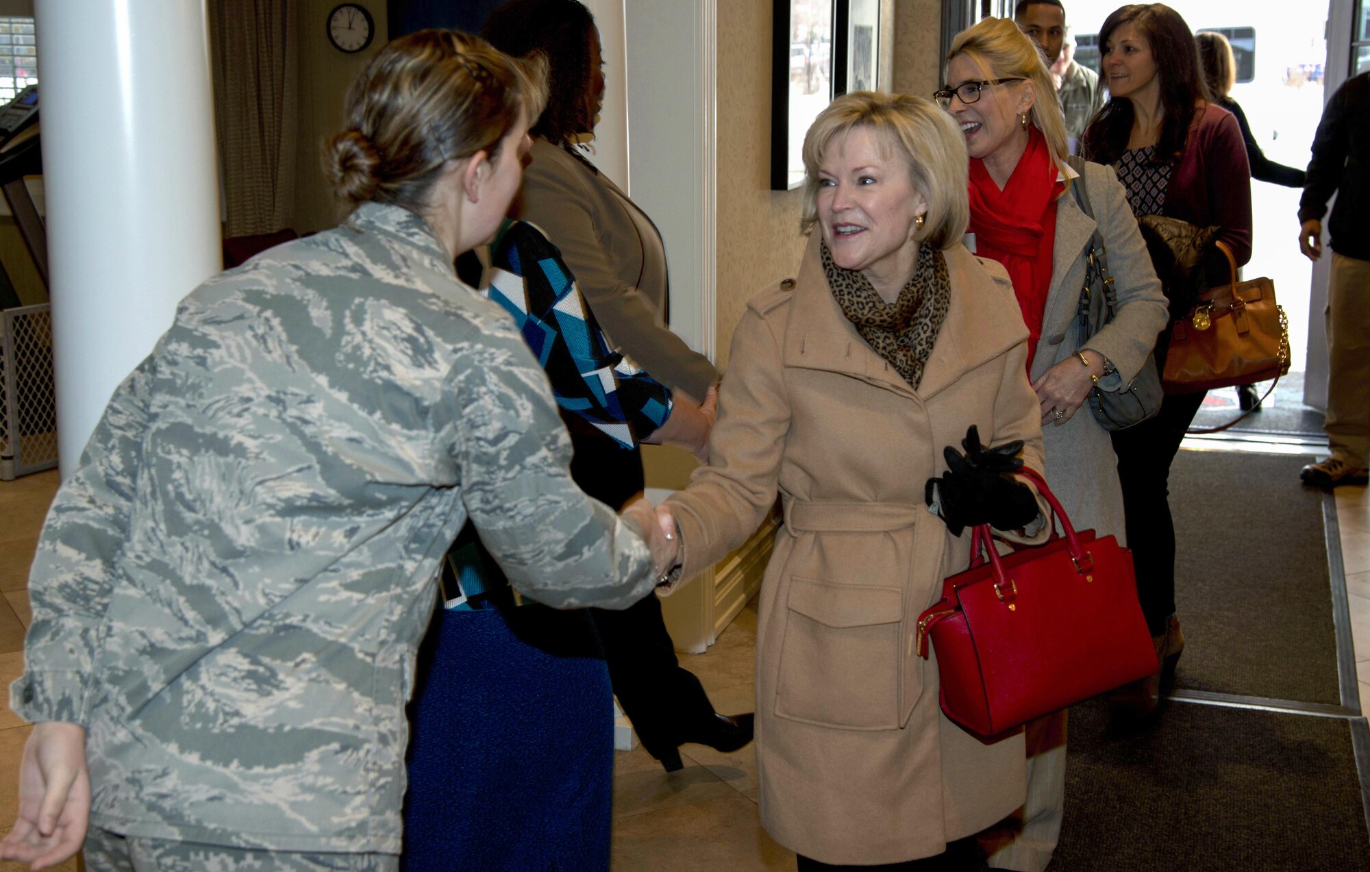 Dawn Goldfein, right, arrives at the Alaska Fisher House to attend a Key Spouse Program luncheon while visiting Joint Base Elmendorf-Richardson, Alaska, Nov. 10, 2016. The Key Spouse Program is an official unit/family program designed to enhance readiness and establish a sense of Air Force community. Mrs. Goldfein was at JBER while accompanying her husband, Air Force Chief of Staff Gen. David L. Goldfein, as he toured various Pacific Air Forces installations.
