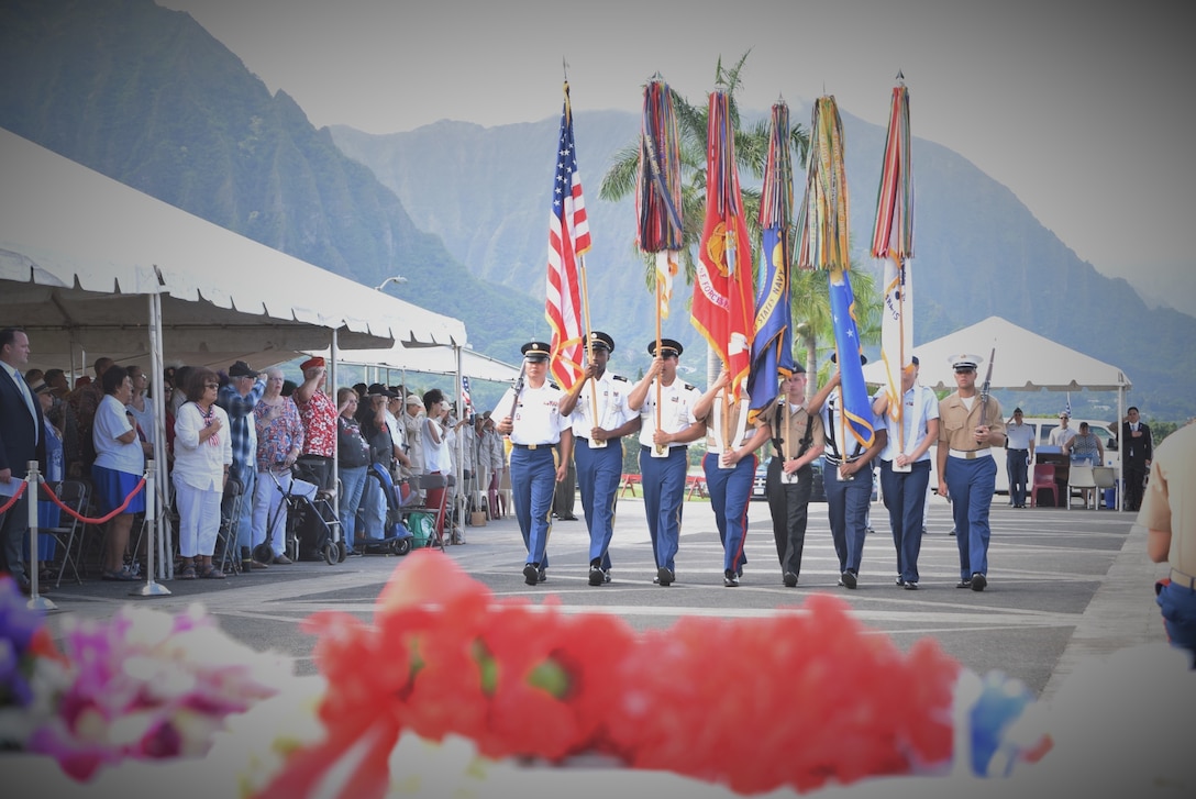 A color guard from U.S. Armed Forces in the Pacific retire the colors at a Veteran’s Day ceremony at the Hawaii State Veterans Cemetery, Kaneohe, Hawaii, Nov. 11, 2016. Air Force photo by Master Sgt. Todd Kabalan