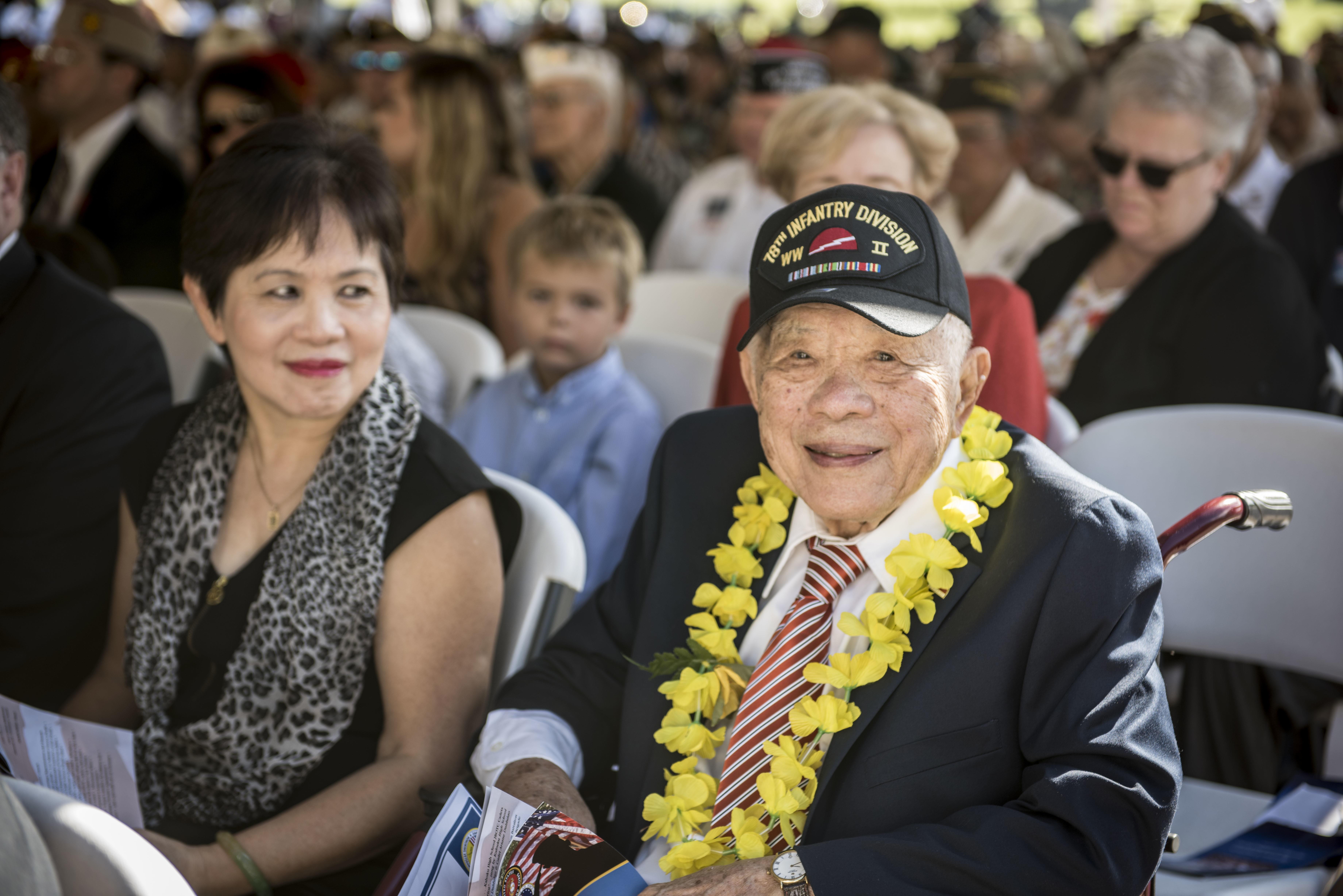World War II veteran Daniel Lau attends a Veterans Day ceremony at the National Memorial Cemetery of the Pacific in Honolulu.