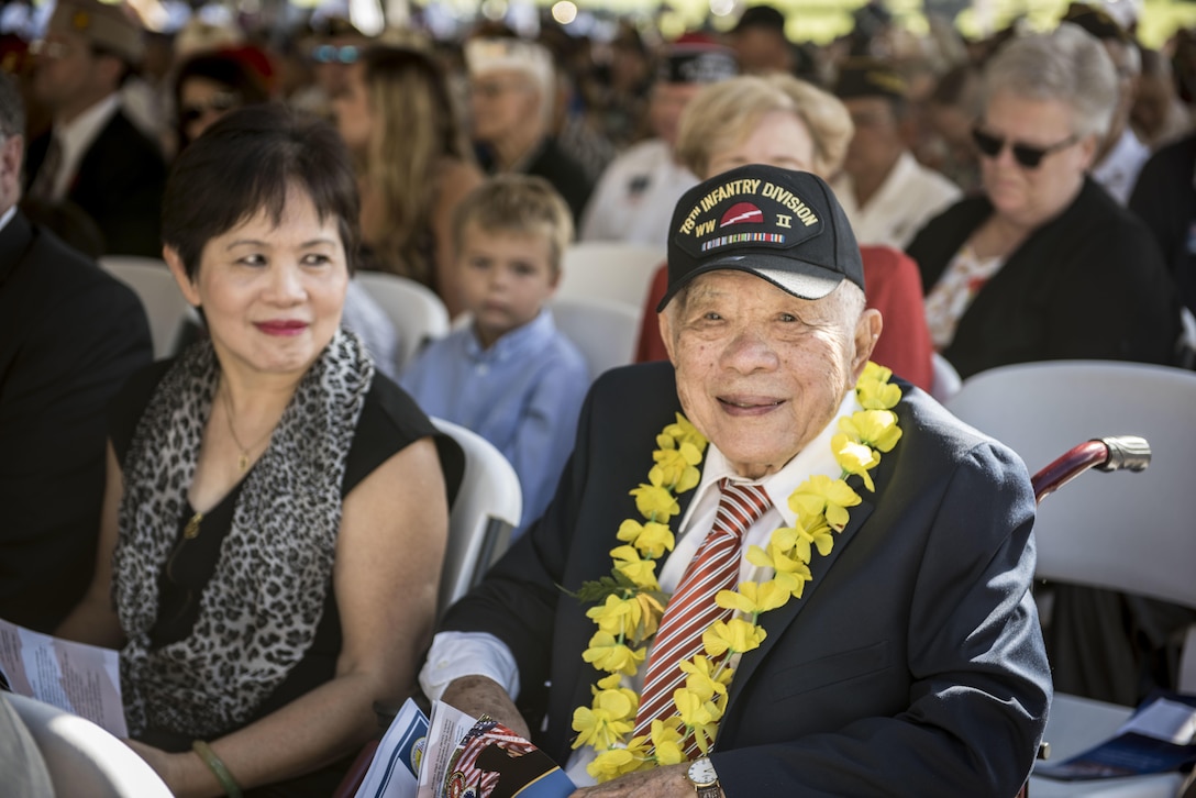 World War II veteran Daniel Lau attends a Veterans Day ceremony at the National Memorial Cemetery of the Pacific in Honolulu, Nov. 11, 2016. Lau served in both theaters during World War II and fought in The Battle of the Bulge. Navy photo by Petty Officer 2nd Class Aiyana S. Paschal