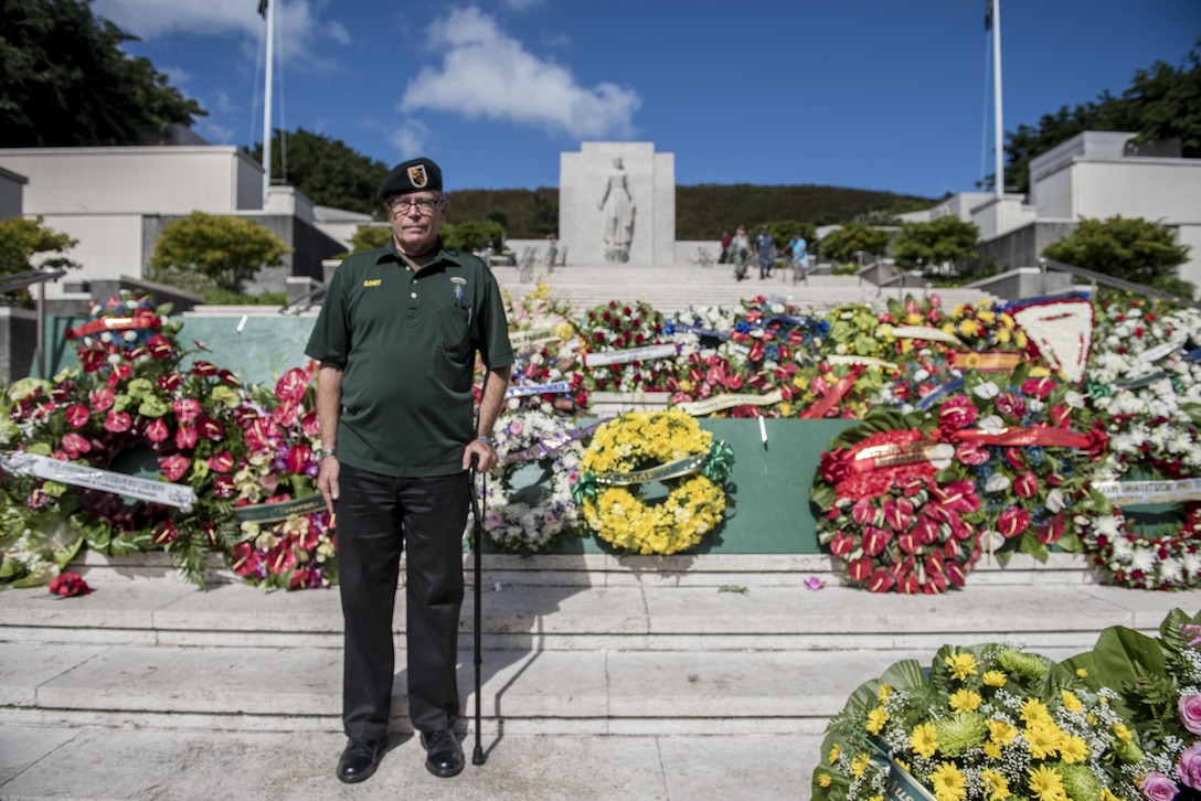 Vietnam veteran retired Air Force Col. Gary Chamberlin stands in front of the Green Beret wreath during a Veterans Day ceremony at the National Memorial Cemetery of the Pacific in Honolulu, Nov. 11, 2016. Chamberlin, who retired from the Air Force, served as an Army Green Beret in the Vietnam War. Navy photo by Petty Officer 2nd Class Aiyana S. Paschal