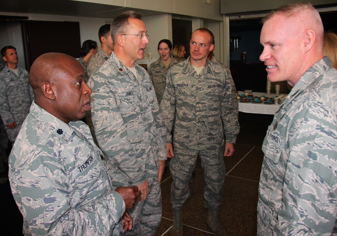 "Welcome to the Medical Group"  At left, Lt. Col. Robert Thompson introduces himself as one of many Illinois military members who serve the nation under 22nd Air Force, and the Air Force Reserve Command. The 932nd Airlift Wing has four groups and Lt. Col. Robert Thompson, is part of the 932nd Medical Group and the 932nd Medical Squadron.  He is shown here welcoming the new commander of the 932nd Medical Group, Col. Leon Barringer, to the base following an assumption of command event on November 6, 2016.  (U.S. Air Force photo by Lt. Col. Stan Paregien)