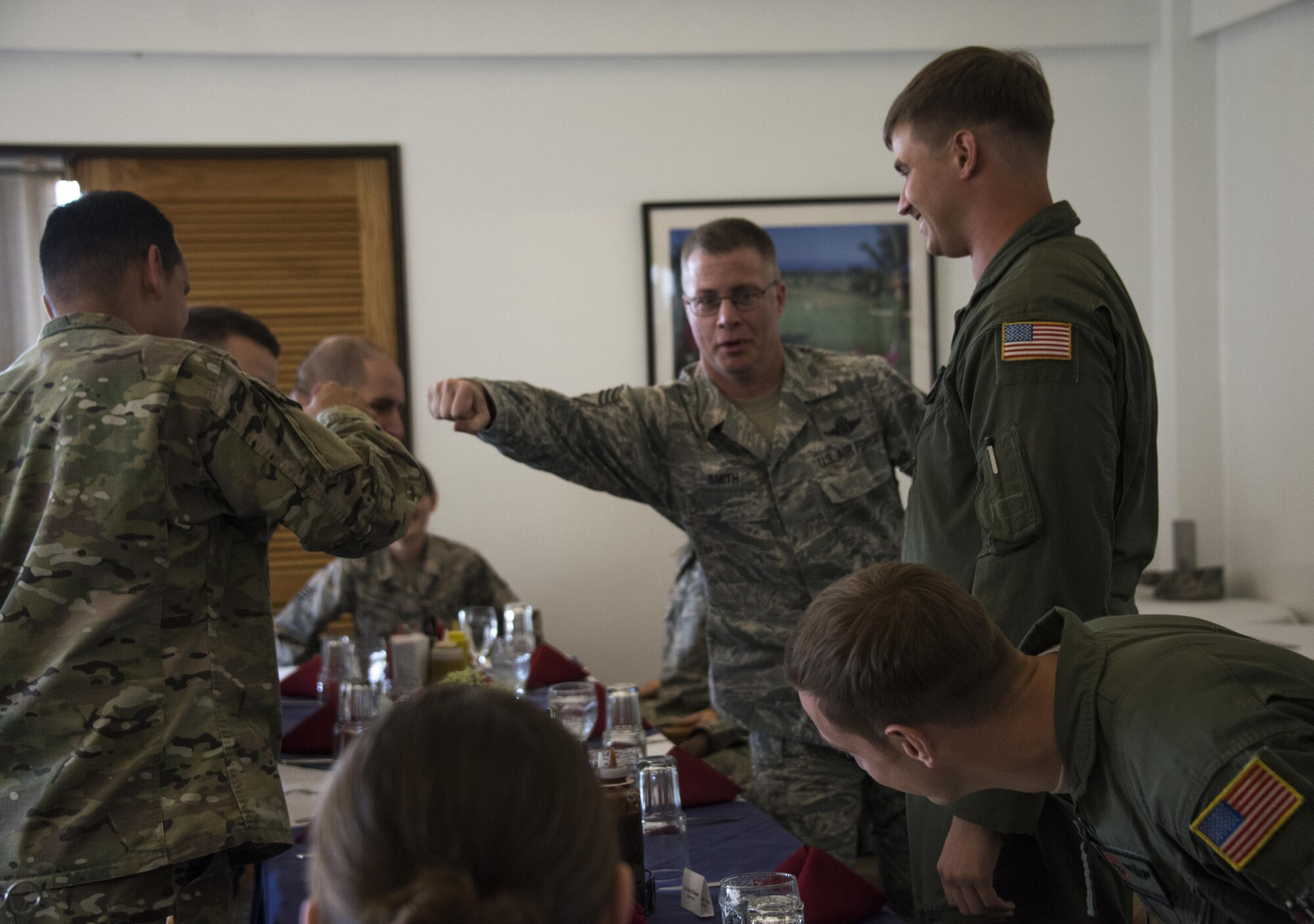 Air Force Special Operations Command Chief Master Sgt. Gregory Smith engages with members of the 353rd Special Operations Group during an Airmen luncheon, Nov. 7, 2016, at Kadena Air Base, Okinawa, Japan. As a part of his first Indo-Asia-Pacific tour since taking command, Webb took the time to meet with the Air Commandos and thank them for their service and sacrifice. (U.S. Air Force photo by Capt. Jessica Tait)