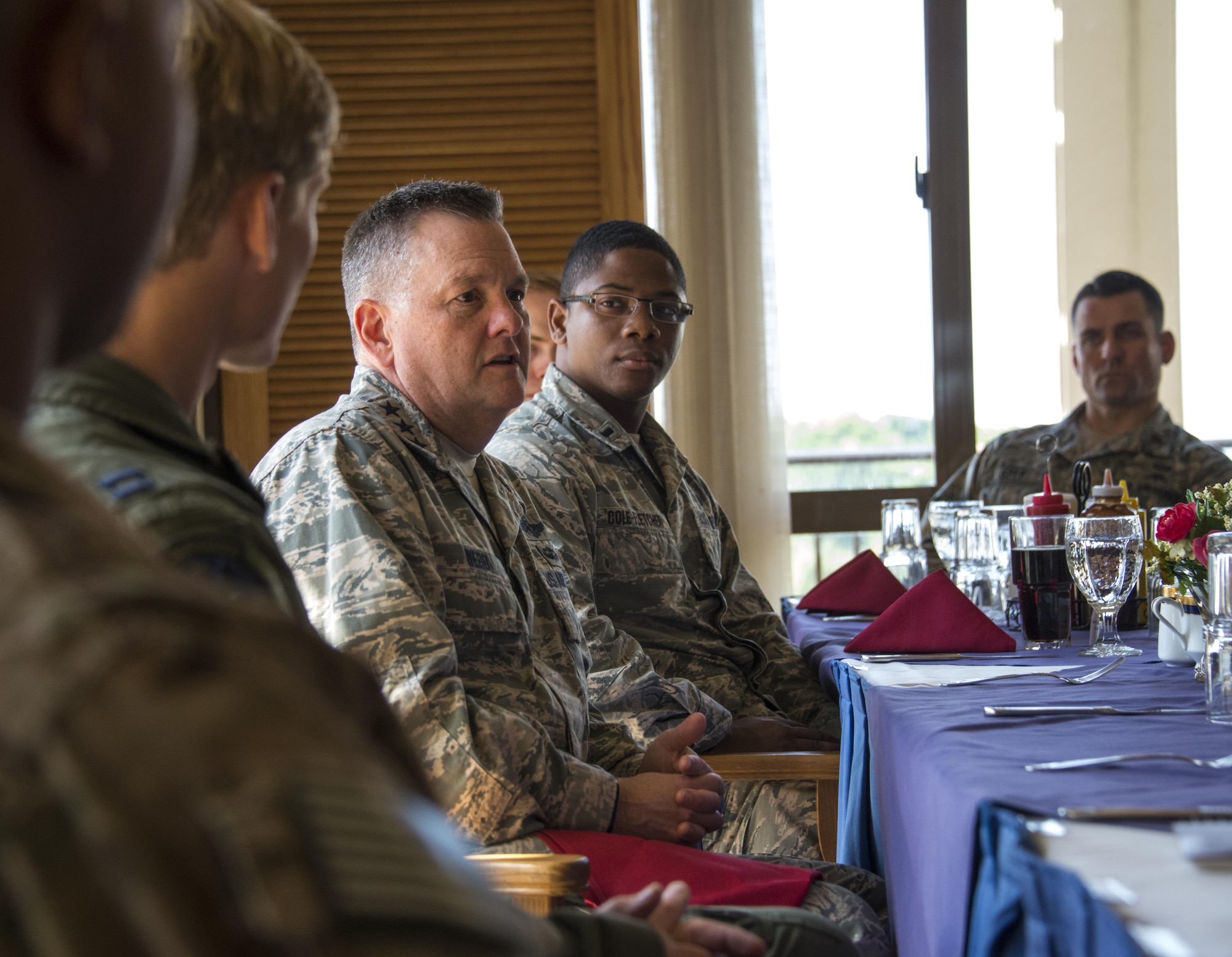 U.S. Air Force Lt. Gen. Brad Webb, commander of Air Force Special Operations Command, sits with members of the 353rd Special Operations Group at an Airman luncheon, Nov. 7, 2016, at Kadena Air Base, Okinawa, Japan. As a part of his first Indo-Asia-Pacific tour since taking command, Webb took the time to meet with the Air Commandos and thank them for their service and sacrifice. (U.S. Air Force photo by Capt. Jessica Tait)