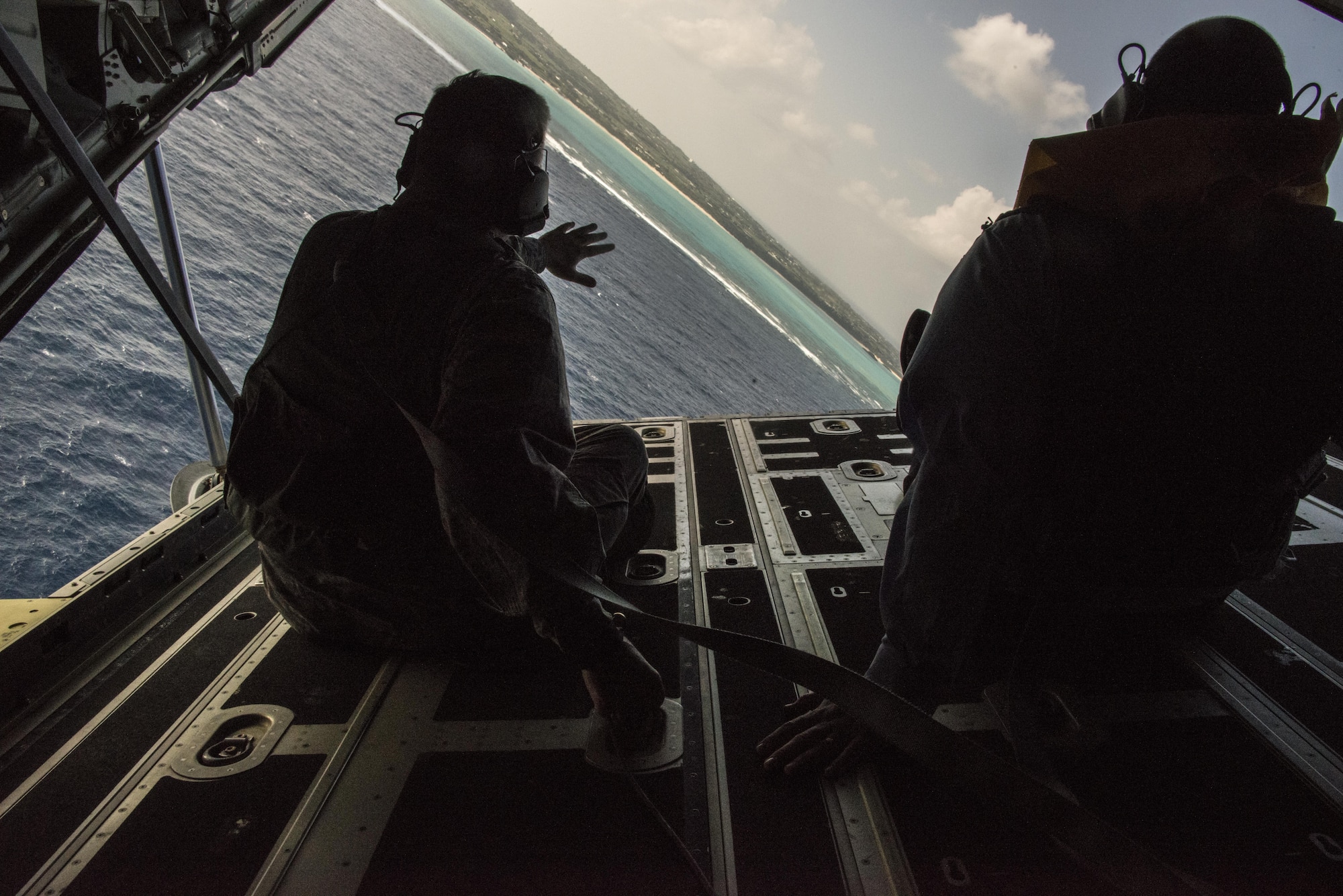 U.S. Air Force Lt. Gen. Brad Webb, commander of Air Force Special Operations Command, looks out the back of an MC-130J Commando II during an island tour of Okinawa, Japan, Nov. 7, 2016. Webb flew on the MC-130J as a part of his visit to the 353rd Special Operations Group. (U.S. Air Force photo by Capt. Jessica Tait)