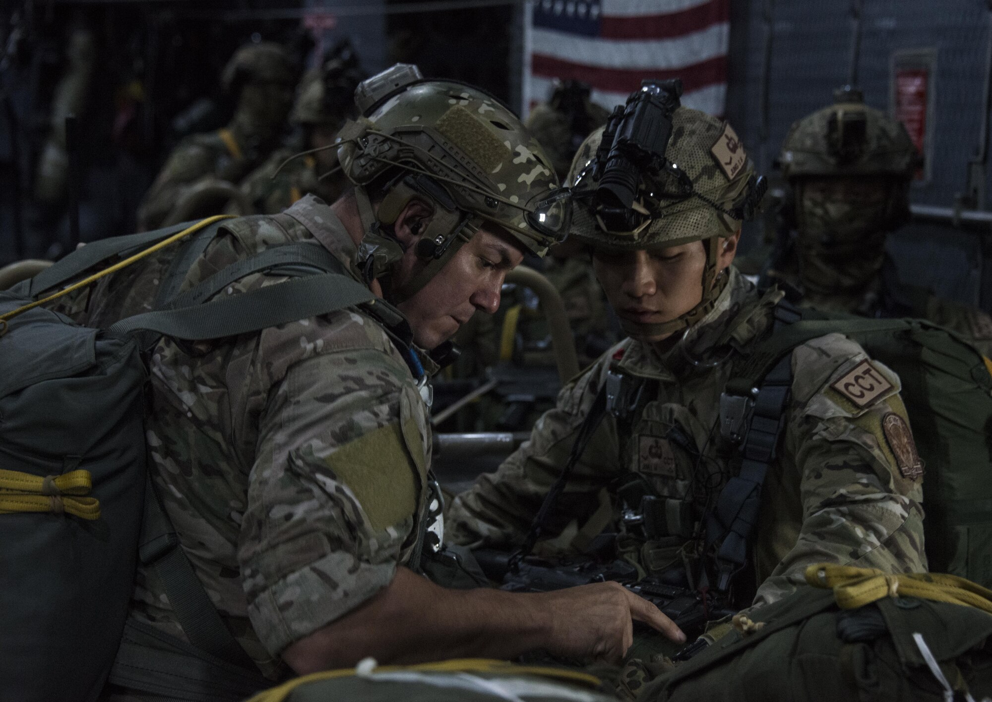 Jumpmasters assigned to the 320th Special Tactics Squadron and Republic of Korea (ROK) 255th Special Operations Squadron, prepare to execute parachute operations from and MC-130H Combat Talon II assigned to the 1st Special Operations Squadron. Last February, the 353rd Special Operations Group conducted their first joint, combined exchange training (JCET) deployment with the 255th SOS in over a decade. With an established baseline, the units further developed their interoperability and capabilities during Teak Knife 2016 at Kunsan Air Base, Oct. 13-26, 2016. (U.S. Air Force photo by Capt. Jessica Tait)