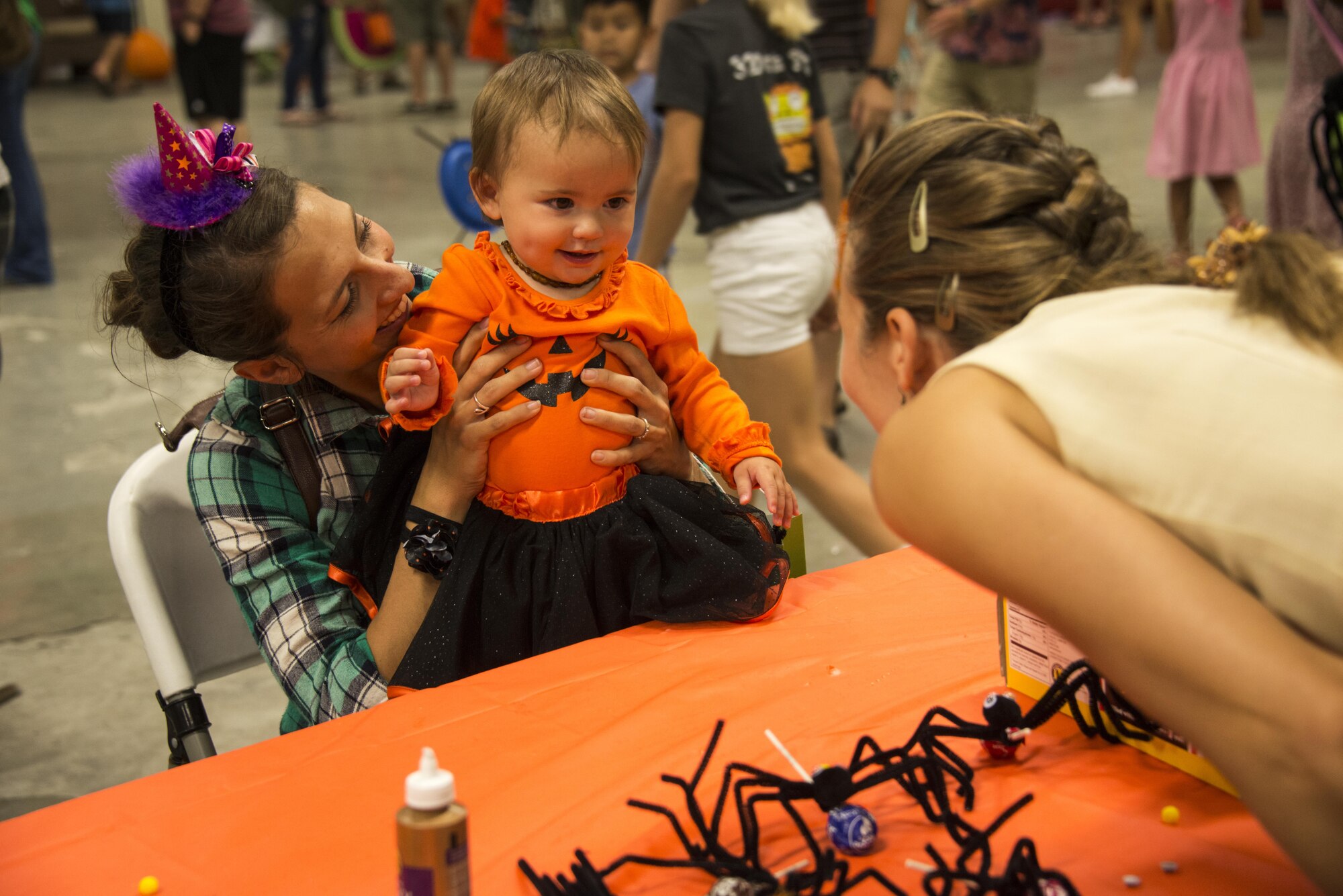Over 200 people to include families from the 353rd Special Operations Group and Naha Rescue Squadron attended Fall Fest 2016 at Kadena Air Base, Oct. 29, 1016. The group’s military spouses donated money and 20 hours of their time to plan the event. (U.S. Air Force photo by Capt. Jessica Tait)