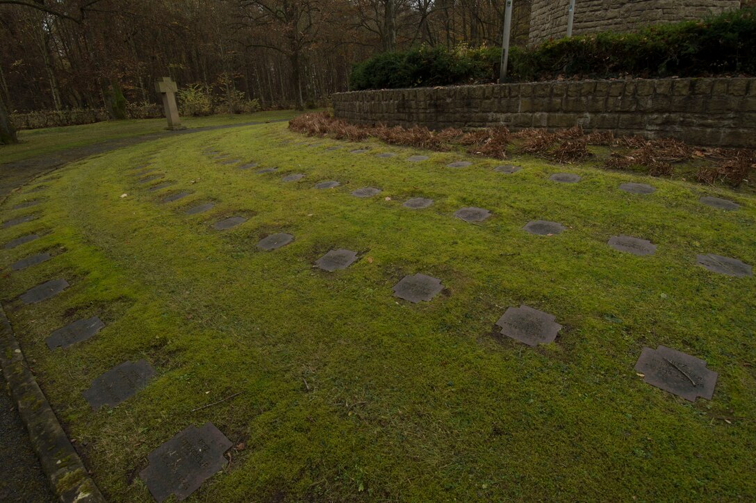 Rows of graves of German soldiers remain on display before a German National Day of Mourning observance ceremony at the Kolmeshöhe Military Cemetery in Bitburg, Germany, Nov. 13, 2016. The day, known as Volkstrauertag in German, observes the human cost of war and was established following the conclusion of the First World War. (U.S. Air Force photo by Staff Sgt. Joe W. McFadden)