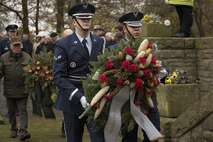 Ceremonial guardsmen from the 52nd Fighter Wing, Spangdahlem Air Base, Germany, present a wreath during a German National Day of Mourning observance ceremony at the Kolmeshöhe Military Cemetery in Bitburg, Germany, Nov. 13, 2016. The day, known as Volkstrauertag in German, observes the human cost of war and was established following the conclusion of the First World War. (U.S. Air Force photo by Staff Sgt. Joe W. McFadden)