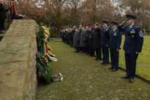 Leaders from the 52nd Fighter Wing, Spangdahlem Air Base, Germany, and German citizens pause after presenting wreaths during a German National Day of Mourning observance ceremony at the Kolmeshöhe Military Cemetery in Bitburg, Germany, Nov. 13, 2016. The day, known as Volkstrauertag in German, observes the human cost of war and was established following the conclusion of the First World War. (U.S. Air Force photo by Staff Sgt. Joe W. McFadden)