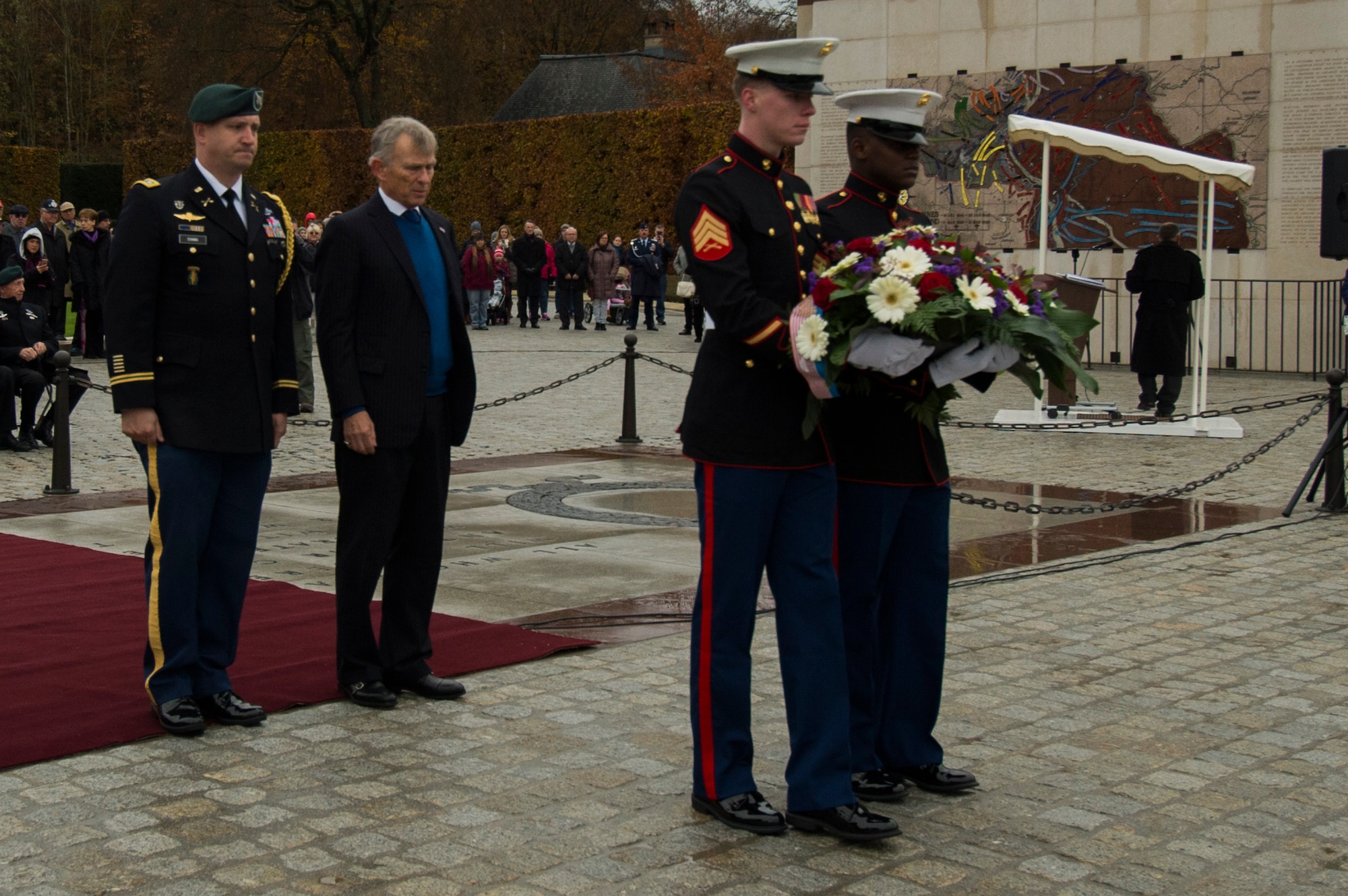 David McKean, U.S. Ambassador to the Grand Duchy of Luxembourg, center right, waits with a detail of American service members before presenting a wreath during a Memorial Day ceremony at the Luxembourg American Military Cemetery and Memorial in Luxembourg, Nov. 11, 2016. The ceremony paid tribute to the legacy of service of members of the American armed forces. (U.S. Air Force photo by Staff Sgt. Joe W. McFadden)