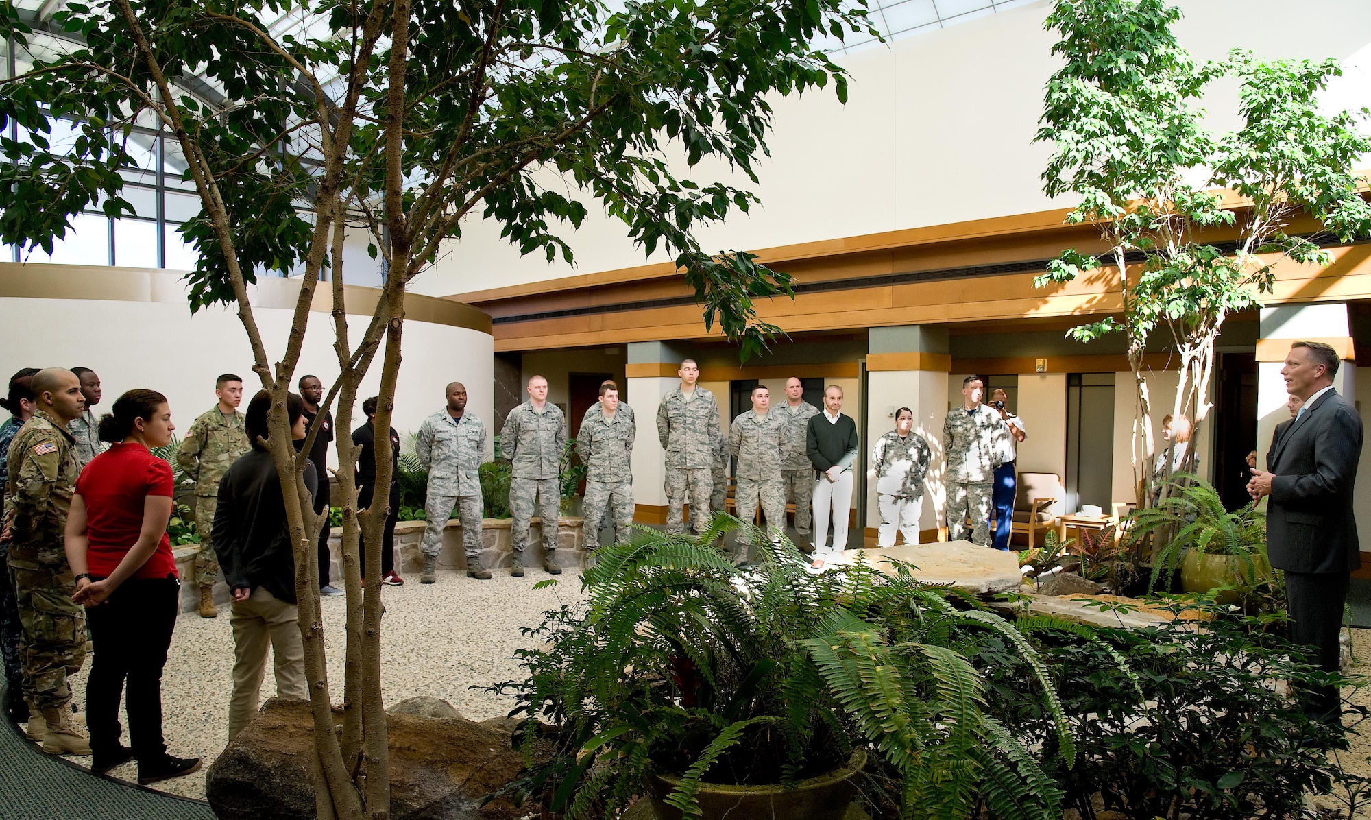 Todd Weiler, Assistant Secretary of Defense Manpower and Reserve Affairs, addresses the Air Force Mortuary Affairs Operations team in the atrium of the Charles C. Carson Center for Mortuary Affairs, at Dover Air Force Base, Del., Nov. 4, 2016. Weiler visited the mortuary as well as the Campus for the Families of the Fallen. (U.S. Air Force photo by Roland Balik)