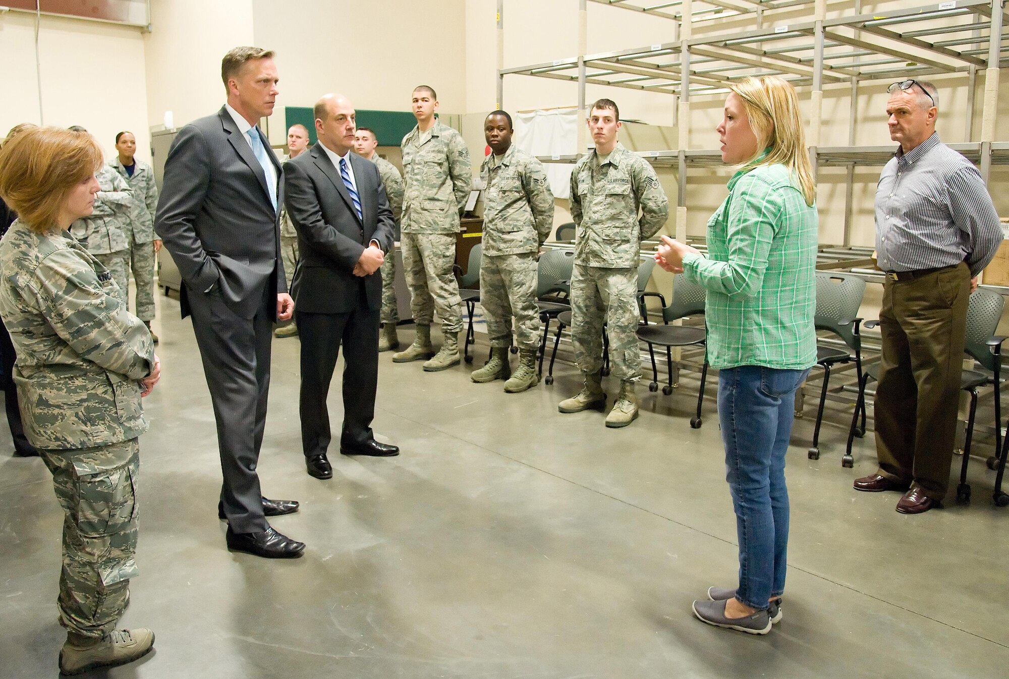 Danielle Wilk, Air Force Mortuary Affairs Operations mortuary specialist, briefs Todd Weiler, Assistant Secretary of Defense Manpower and Reserve Affairs, and Ronald Keohane, Deputy Assistant Secretary of Defense for Military Community and Family Policy, Nov. 4, 2016. Weiler and Keohane visited AFMAO, the Fisher House, Center for Families of the Fallen, Armed Forces Medical Examiner System, and the Joint Personal Effects Depot. (U.S. Air Force photo by Roland Balik)