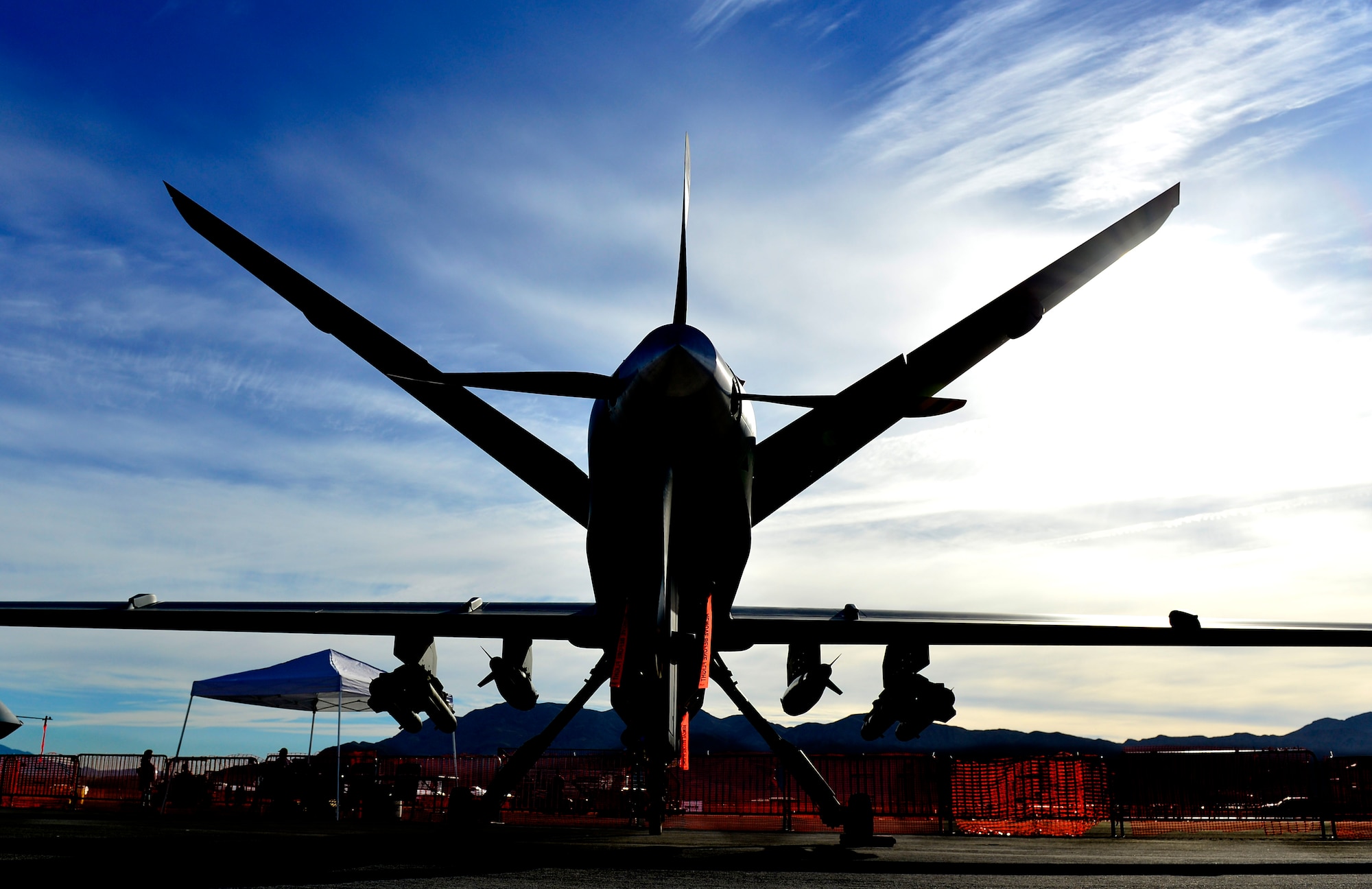 An MQ-9 Reaper sits on display during Aviation Nation Nov. 12, 2016, at Nellis Air Force Base, Nevada. An MQ-9 Reaper and MQ-1 Predator were displayed at the air show. The MQ-1 and MQ-9 are both medium-altitude, long-endurance remotely piloted aircraft capable of supporting persistent attack and reconnaissance in support of global contingency operations. (U.S. Air Force photo by Senior Airman Christian Clausen/Released)