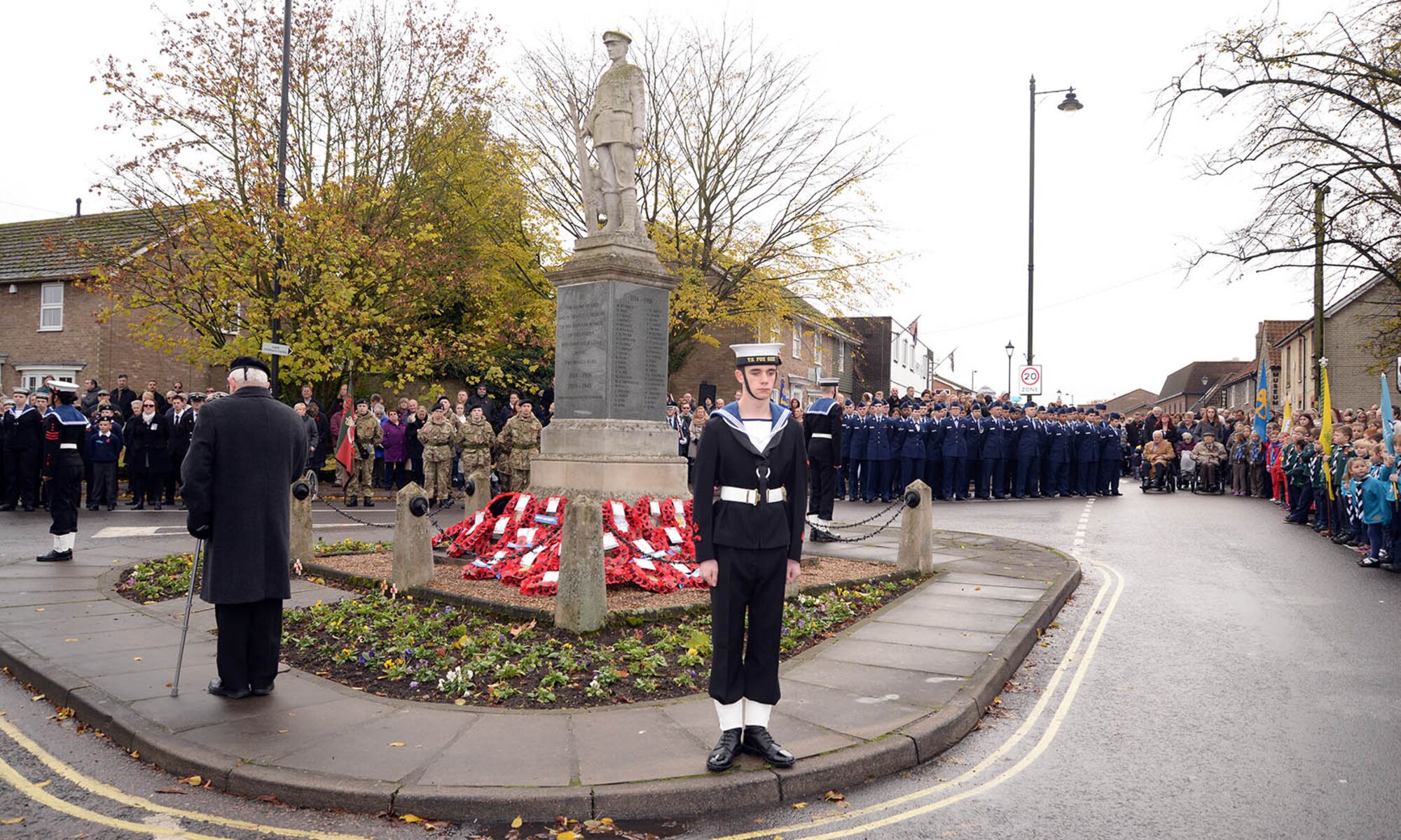 U.S. Air Force Airmen from RAF Mildenhall stand alongside Sea Cadets, Army Cadets, Air Cadets, Royal British Legion veterans and many other groups from the local community during the Remembrance Sunday parade Nov. 13, 2016, in Mildenhall, England. Remembrance Sunday was originally named Armistice Day after World War I, which ended at the 11th hour on the 11th day of the 11th month in 1918. It was then renamed Remembrance Sunday after World War II and now honors all the men and women who died serving their country in wars past and present. (U.S. Air Force photo by Karen Abeyasekere)