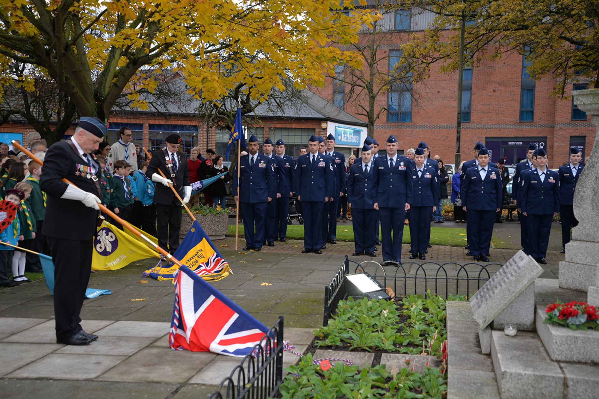 U.S. Air Force Airmen from RAF Mildenhall stand alongside Royal British Legion veterans, Sea Cadets, Army Cadets, Air Cadets and many other groups from the local community during the Remembrance Sunday parade Nov. 13, 2016, in Newmarket, England. Airmen from RAF Mildenhall participated in ceremonies and services throughout the local area to honor those who lost their lives in past and present conflicts. (U.S. Air Force photo by Karen Abeyasekere)