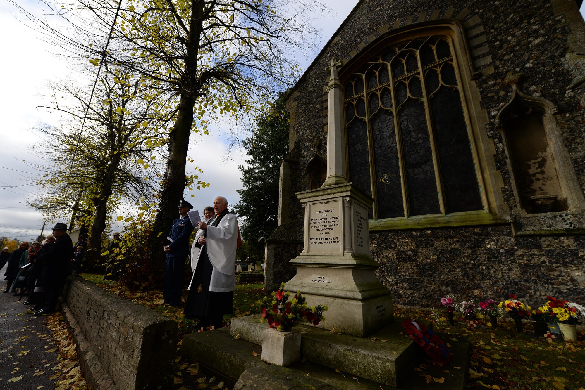 Rev. Norman Steer, British Legion chaplain, gives opening remarks during a Remembrance Sunday ceremony Nov. 13, 2016, in Dickleburgh, England. U.S. Air Force Airmen from RAF Mildenhall, England, participated in ceremonies and services throughout the local area to honor those who died during previous and current conflicts.  (U.S. Air Force photo by Staff Sgt. Micaiah Anthony)