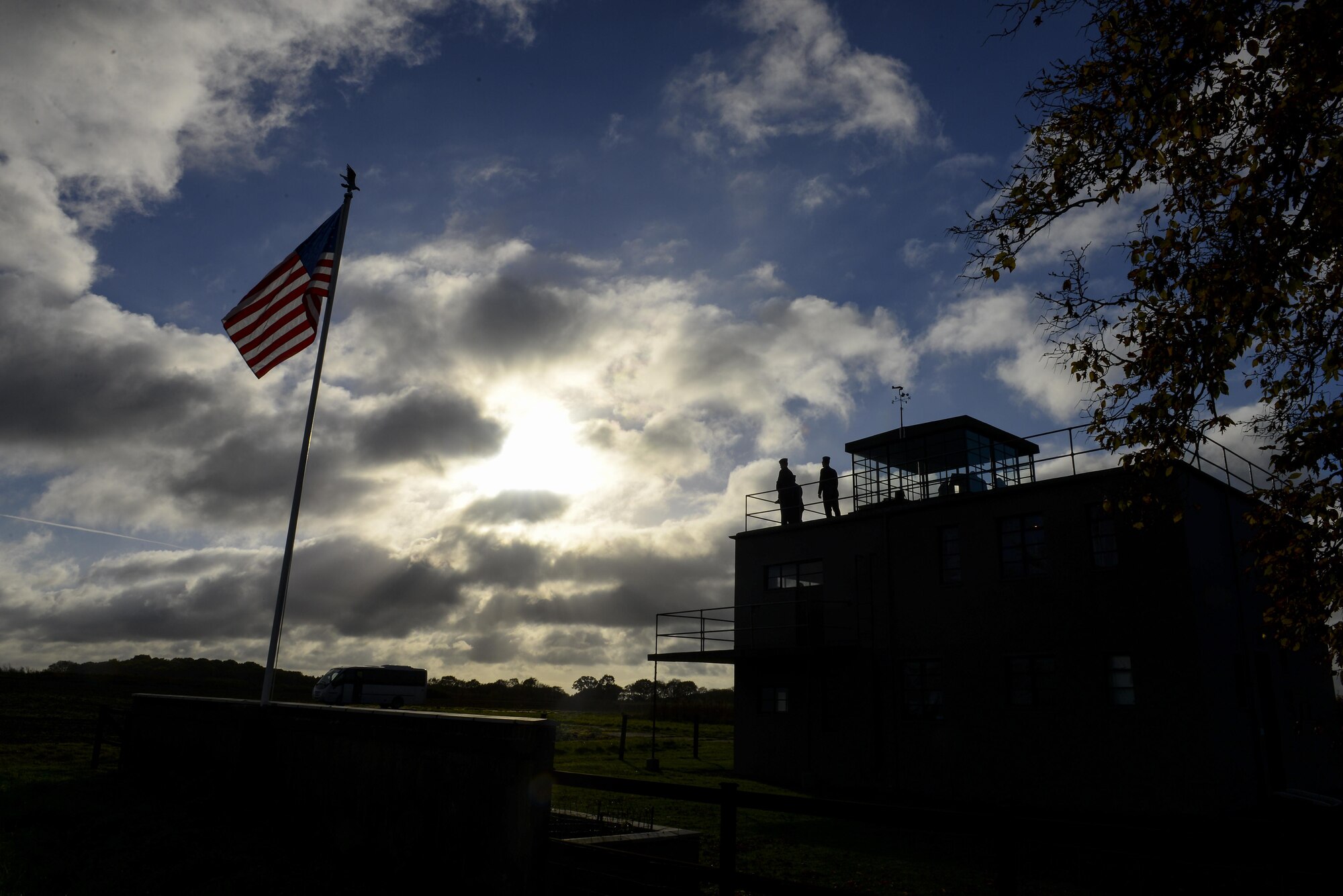 U.S. Air Force Airmen from RAF Mildenhall, England, look out from the air traffic control tower Nov. 13, 2016, at the 100th Bomb Group Memorial Museum in Dickleburgh, England. Airmen visited the museum after participating in a local remembrance ceremony to honor those who have died in previous conflicts. (U.S. Air Force photo by Staff Sgt. Micaiah Anthony)
