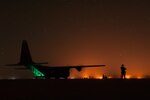 Airmen assigned to the 821st Contingency Response Group perform a variety of airfield operation duties at Qyarrayah West airfield, Oct. 28, 2016. The 821st CRG is highly-specialized in training and rapidly deploying personnel to quickly open airfields and establish, expand, sustain and coordinate air mobility operations. (U.S. Air Force by photo Staff Sgt. Adam Kern)