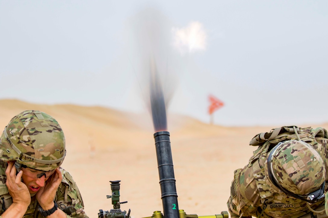 Mortar Soldiers with the 77th Armored Regiment, 3rd Brigade, 1st Armored Division, firea 60mm mortar round to provide indirect, suppressive fire for infantry Soldiers during a squad live-fire exercise Nov. 3, 2016 at Udari Range near Camp Buehring, Kuwait.  Mortar fire was part of the four-day training exercise that synchronized the capabilities of infantry Soldiers, indirect fire infantrymen and forward observers. (U.S. Army photo by Sgt. Angela Lorden)
