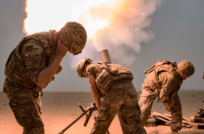 Mortar Soldiers with the 77th Armored Regiment, 3rd Brigade, 1st Armored Division, fire a 120mm mortar round to provide indirect, suppressive fire for infantry Soldiers during a squad live-fire exercise Nov. 3, 2016 at Udari Range near Camp Buehring, Kuwait.  Mortar fire was part of the four-day training exercise that synchronized the capabilities of infantry Soldiers, indirect fire infantrymen and forward observers. (U.S. Army photo by Sgt. Angela Lorden)
