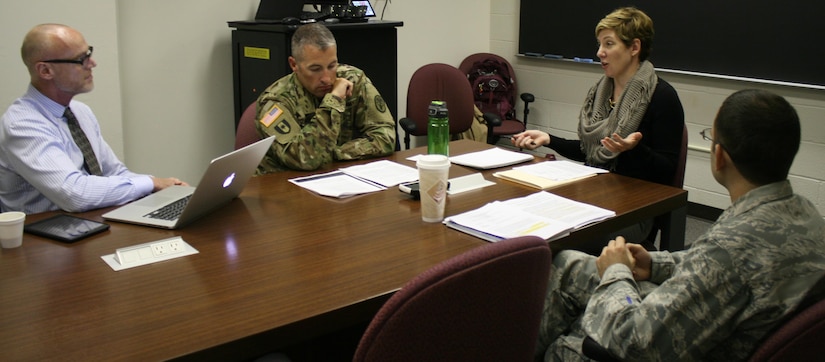 Dr. Alexis Battista, second from right, teaches a seminar at the Uniformed Services University of the Health Sciences in Bethesda, Md. The seminar was part of the university's new Health Professions Education program. DoD photo by Sarah Marshall