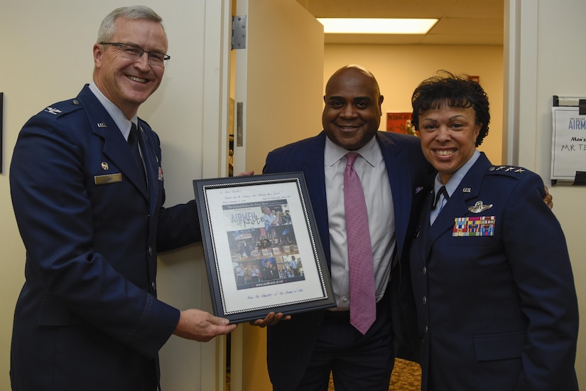 Col. Larry Lang, left, Air Force Band commander and conductor, and Lt. Gen. Stayce Harris, right, Air Force assistant vice chief of staff, gives Terell Stanfford, center, Jazz Heritage Series iconic jazz artist, a token of appreciation in Alexandria, Va., Nov. 11, 2016. Stanfford was one of the three artists to perform in the Jazz Heritage Series. The Airmen of Note first established the series in 1990 and every year the concert features the “Note” with legendary jazz icons. (U.S. Air Force photo by Airman 1st Class Valentina Lopez)
