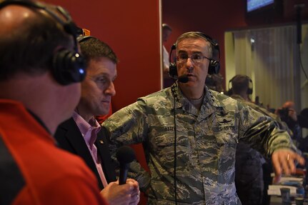 Gen. John E. Hyten, commander of U.S. Strategic Command (USSTRATCOM), speaks during Greg Sharpe’s Husker Sports Network halftime show at the Nebraska Cornhuskers – Minnesota Golden Gophers college football game Nov. 12, 2016, where he was the guest of university president Hank Bounds. The university also provided game tickets to veterans and active duty personnel assigned to USSTRATCOM and area commands as part of the Veterans Day weekend. One of nine DoD unified combatant commands, USSTRATCOM has global strategic missions assigned through the Unified Command Plan that include strategic deterrence; space operations; cyberspace operations; joint electronic warfare; global strike; missile defense; intelligence, surveillance and reconnaissance; combating weapons of mass destruction; and analysis and targeting. (U.S. Navy photo by Petty Officer 1st Class Byron C. Linder)