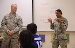 Master Sgts. Carma McCall, 25th Air Force Inspector General's office, and Justin Seigrist, Air Education and Training Command, speak to students at Stevenson Middle School on Veteran's Day. Photo by: Lori A. Bultman