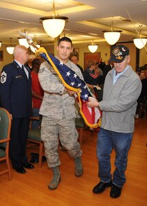 Staff Sgt. Tony Aguilera, 2nd Weather Squadron at Offutt Air Force Base, Neb., and U.S. Navy Vietnam veteran, Richard Coffman, carry the American flag during Eastern Nebraska Veterans’ Home annual Veterans Day program in Bellevue, Neb., Nov. 11, 2016.  The program celebrated the residents who live there along with veterans worldwide. Veterans Day was originally referred to as “Armistice Day” because it was celebrated on the same date that World War I hostilities ended on the 11th hour of the 11th day of the 11th month in 1918. On June 1, 1954, President Dwight D. Eisenhower officially changed the name to Veterans Day, celebrated on Nov. 11 each year, a day to honor American veterans of all wars. (USSTRATCOM photo by Steve Cunningham) 