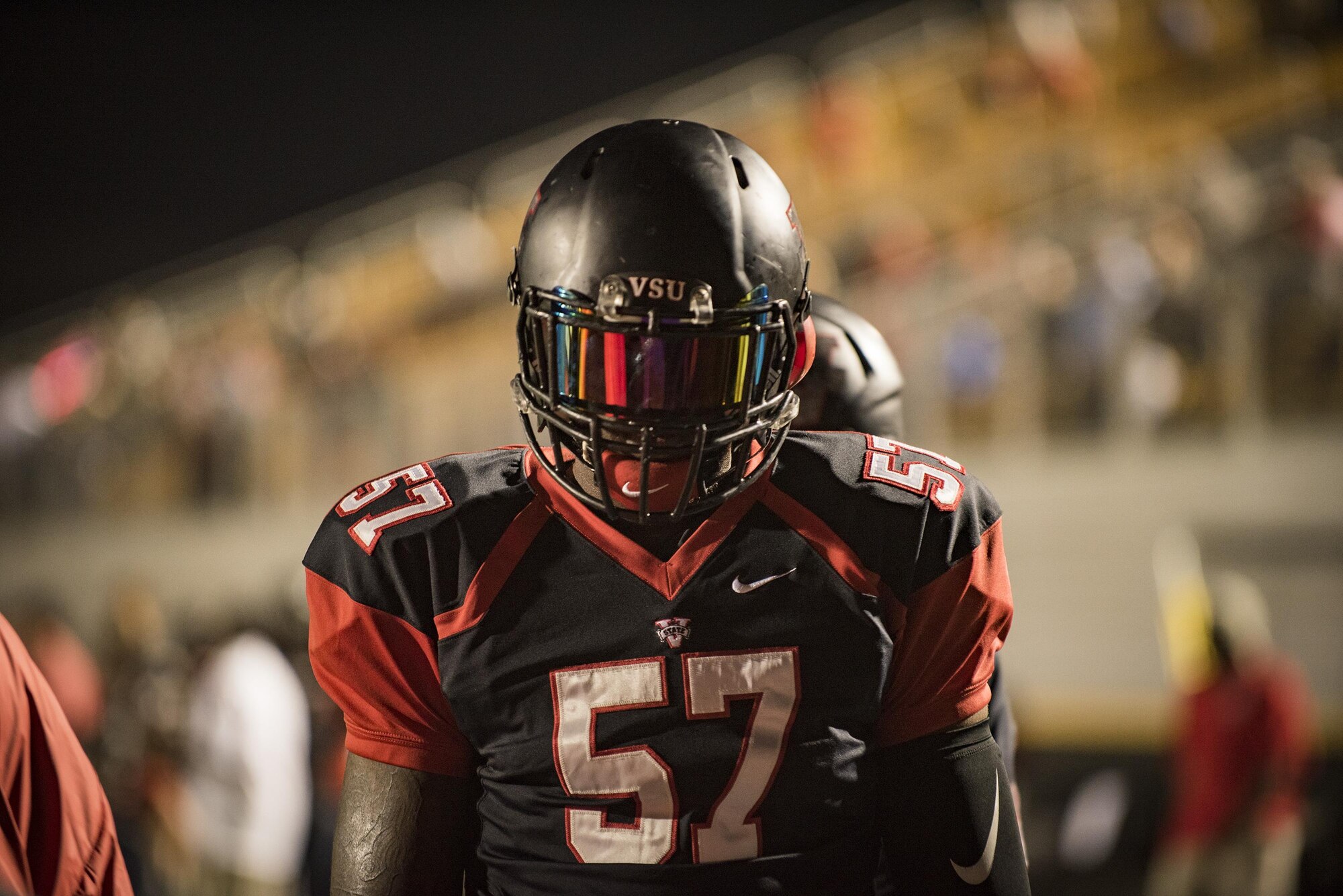 Brandon Kemp, Valdosta State University offensive lineman, prepares for the start of a military appreciation game, Nov. 12, in Valdosta, Ga. After the win, VSU was selected to play in the NCAA Division II playoffs. (U.S. Air Force photo by Airman 1st Class Daniel Snider)