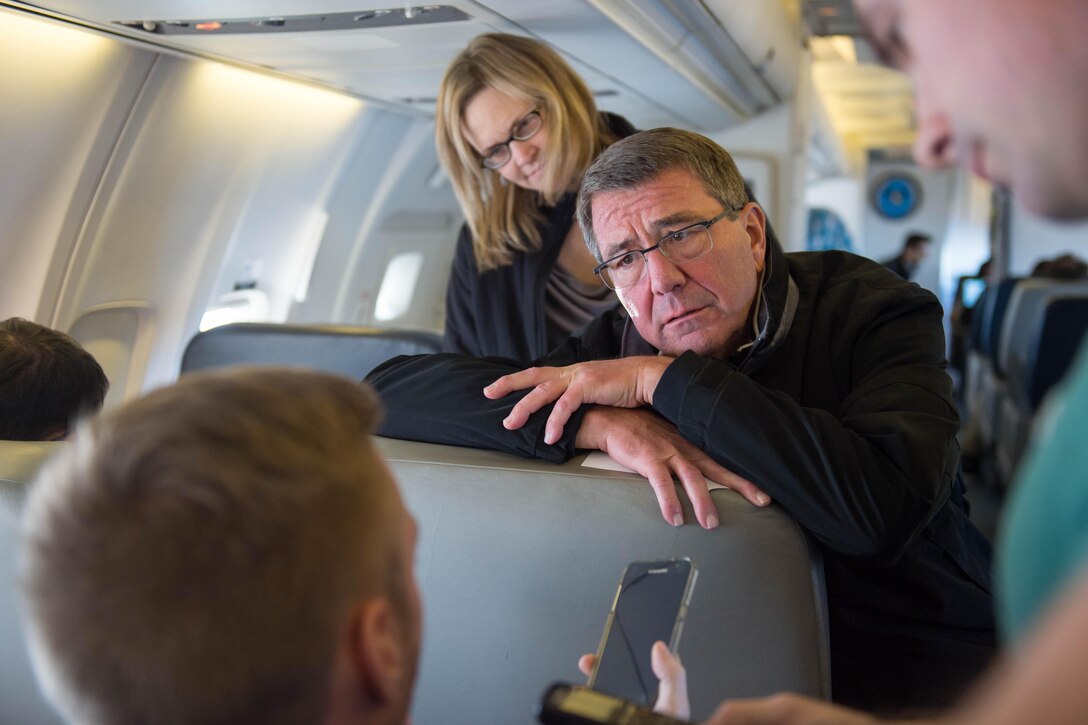 Defense Secretary Ash Carter answers a reporter's question during a flight to California, Nov. 14, 2016. Carter is on a four-day trip focusing on the readiness of the nation's force and the effectiveness of the warfighter's training and equipment. DoD photo by Army Sgt. Amber I. Smith