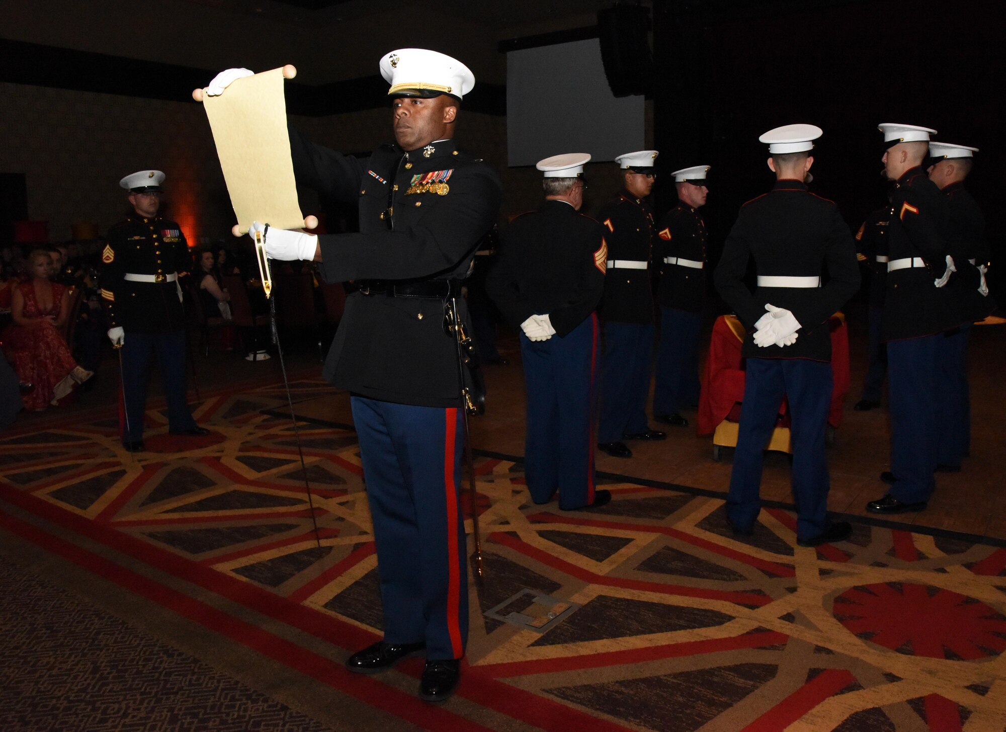 Capt. Ivory Johnson, Keesler Marine Detachment executive officer, reads a birthday message from Gen. John A. Lejeune during the 241st Marine Corps Birthday Ball at the Golden Nugget Casino Nov. 11, 2016, in Biloxi, Miss. Gen. Lejeune was the 13th Commandant of the Marine Corps and his birthday message was read at every Marine Corps Ball this year. More than 300 service members and guests attended the Keesler MARDET-hosted event, and  a guest speaker. (U.S. Air Force photo by Kemberly Groue/Released)