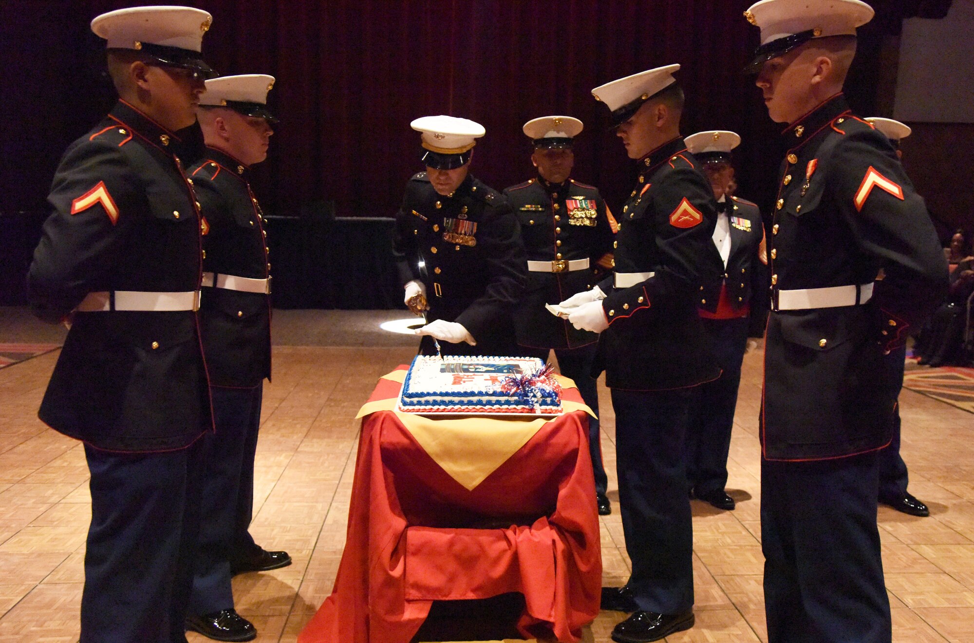 Capt. Gary Baxter, Keesler Marine Detachment commanding officer, cuts the birthday cake using a non-commissioned officer sword during the 241st Marine Corps Birthday Ball at the Golden Nugget Casino Nov. 11, 2016, in Biloxi, Miss. Traditionally, the first piece of cut cake is passed to the oldest, then youngest, Marines in attendance, as a demonstration of passing the honor and experience of the Marine Corps from one generation to the next. The event, hosted by the Keesler MARDET, also featured a guest speaker. (U.S. Air Force photo by Kemberly Groue/Released)