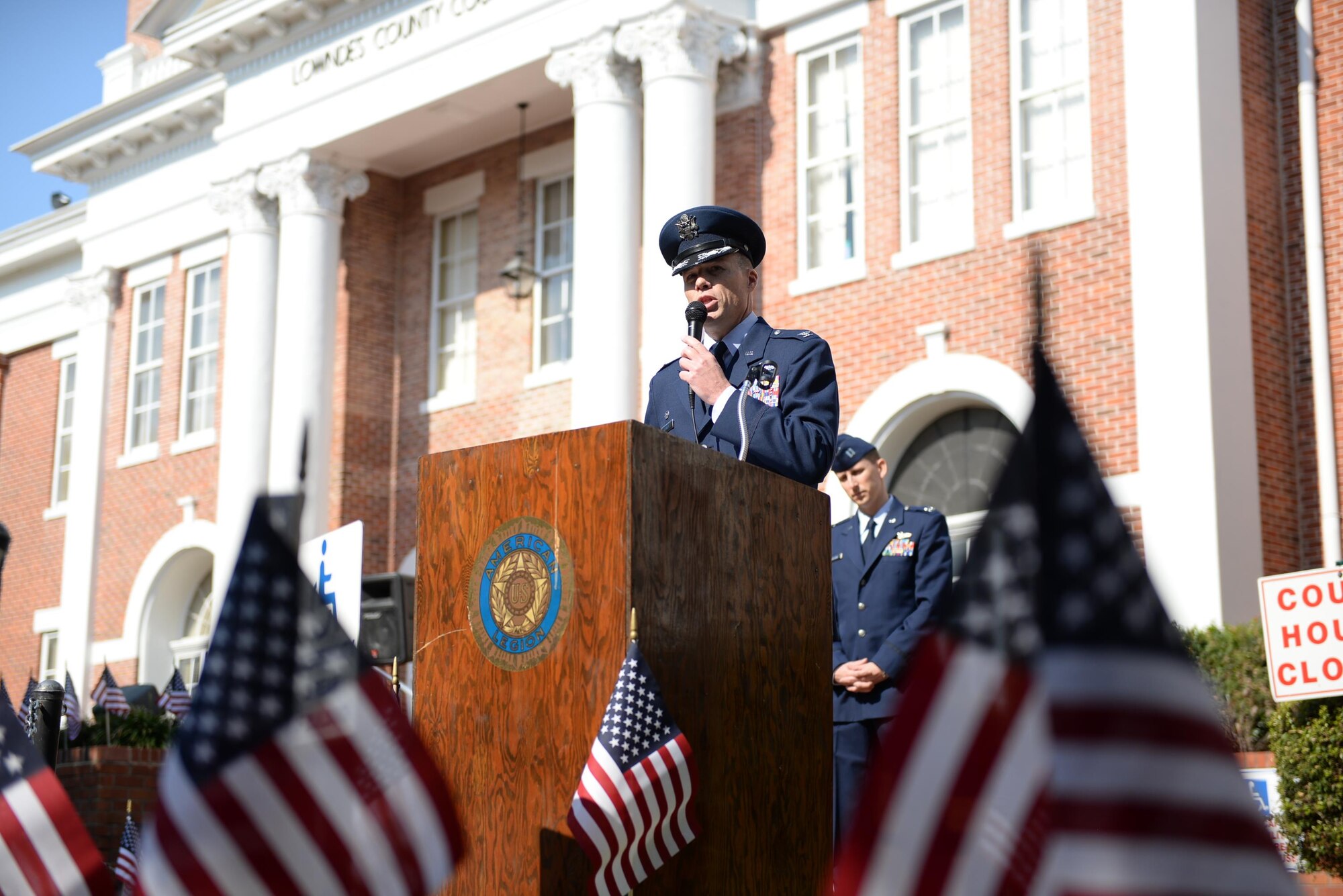 Col. Douglas Gosney, 14th Flying Training Wing Commander, speaks at the 2016 Columbus Veterans Day Wreath-Laying Ceremony Nov. 12, 2016, at the Lowndes County Court House in Columbus, Mississippi. Gosney spoke about what it truly means to be a veteran, the sacrifices they make and highlighted a few veterans from Columbus Air Force Base, Mississippi. (U.S. Air Force photo by Airman 1st Class John Day)