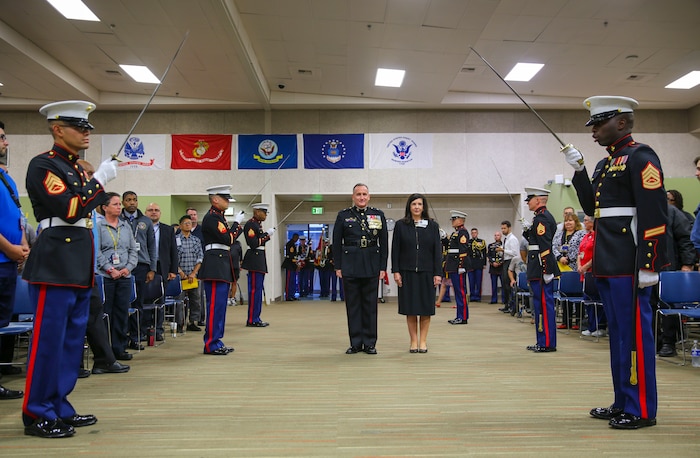 Marines from Marine Corps Recruit Depot San Diego salute General William M. Jurney, commanding general, MCRD San Diego/Western Recruiting Region, and Cynthia E. Abair, Master of Health Administration, acting director, Veterans Affairs San Diego Healthcare System, during a cake cutting ceremony at the VA San Diego Healthcare System, Nov. 7. The ceremony was held in celebration of the Marines Corps’ 241st birthday, which is Nov. 10, 1775.