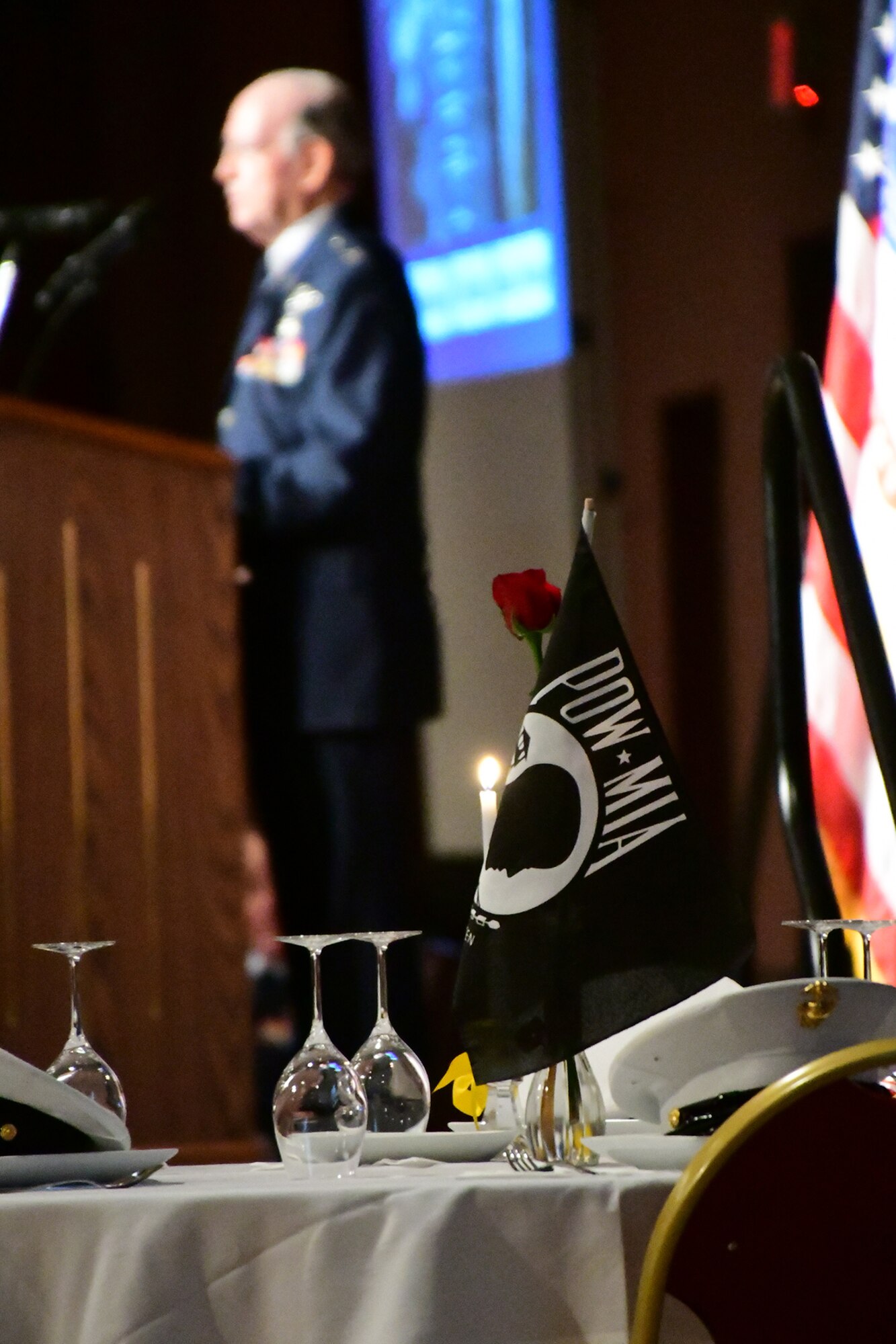 A table is set in honor of the Prisoners of War and Missing In Action during a Welcome Home Vietnam Veterans banquet on Nov. 11, 2016, Bossier City, La. The banquet was hosted by the city of Bossier, who joined in a commemorative partnership with the Long Rangers and Airpower Foundation to honor all veterans who served during the Vietnam War era. (Master Sgt. Laura Siebert/Released)