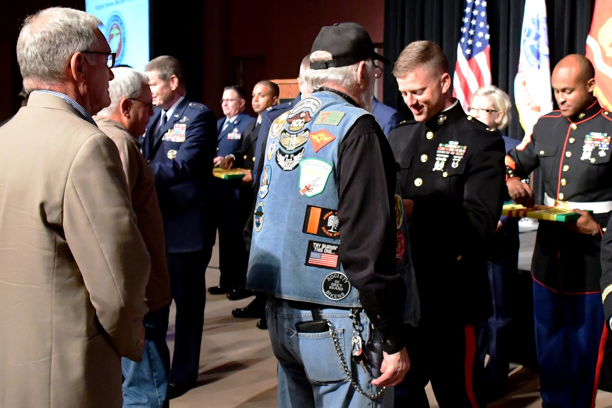 Vietnam Veterans receive a commorative pin during a Welcome Home banquet on Nov. 11, 2016, Bossier City, La. The banquet was dedicated to veterans who served in any branch of the U.S. military during the Vietnam War era. (U.S. Air Force photo by Master Sgt. Laura Siebert/Released)