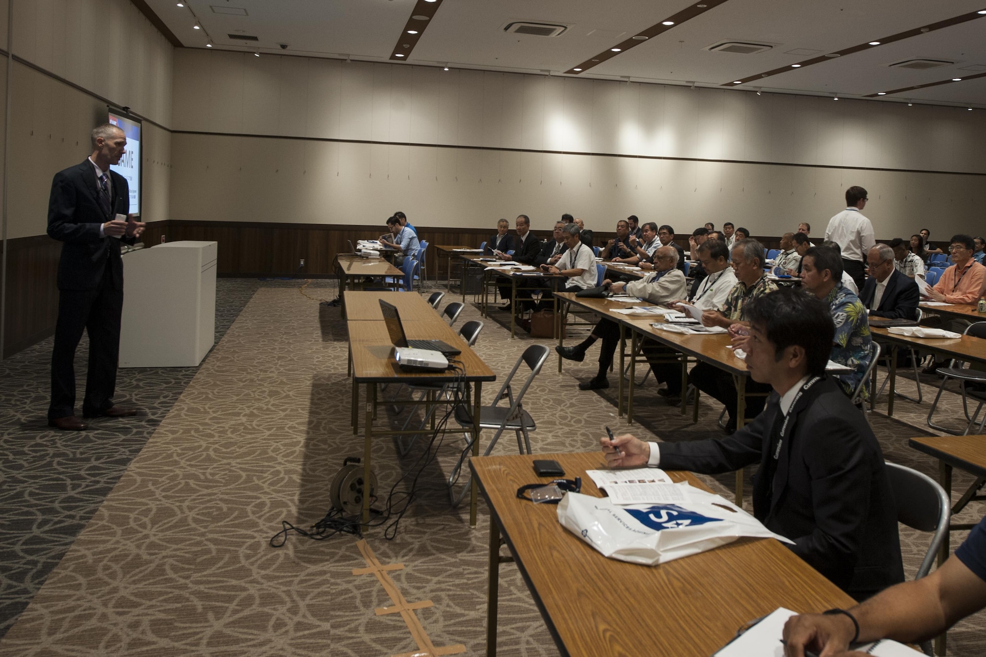 U.S. Air Force Col. Robert Grainger, 18th Civil Engineer Group commander, speaks during the Society of American Military Engineers Japan Post symposium Nov. 7, 2016, in Okinawa, Japan. The Society of American Military Engineers is an organization dedicated to bringing engineers, both military and local citizens, together for mutual learning. (U.S. Air Force photo by Senior Airman Lynette M. Rolen/Released)