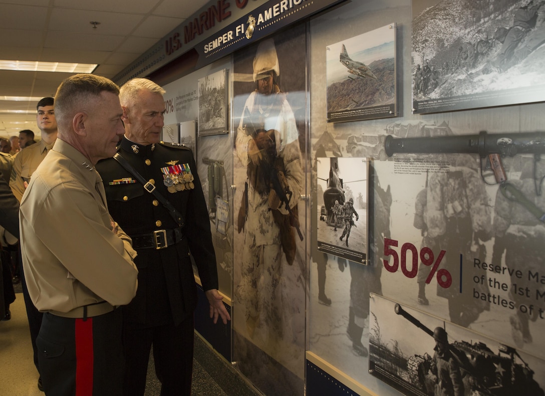 Lt. Gen. Rex C. McMillian, commander of Marine Forces Reserve and Marine Forces North, and Lt. Gen. Jon M. Davis, deputy commandant for Marine Corps aviation, view the Marine Corps Reserve Centennial wall display at the Pentagon, Arlington, Va., Nov. 9, 2016. The exhibit was installed at the Pentagon in conjunction with the 100th anniversary of the Marine Corps Reserve, which was celebrated Aug. 29, 2016. For more information on the history and heritage of the Marine Corps Reserve as well as current Marine stories and upcoming Centennial events, please visit www.marines.mil/usmcr100. (U.S. Marine Corps photo by Sgt. Ian Leones)