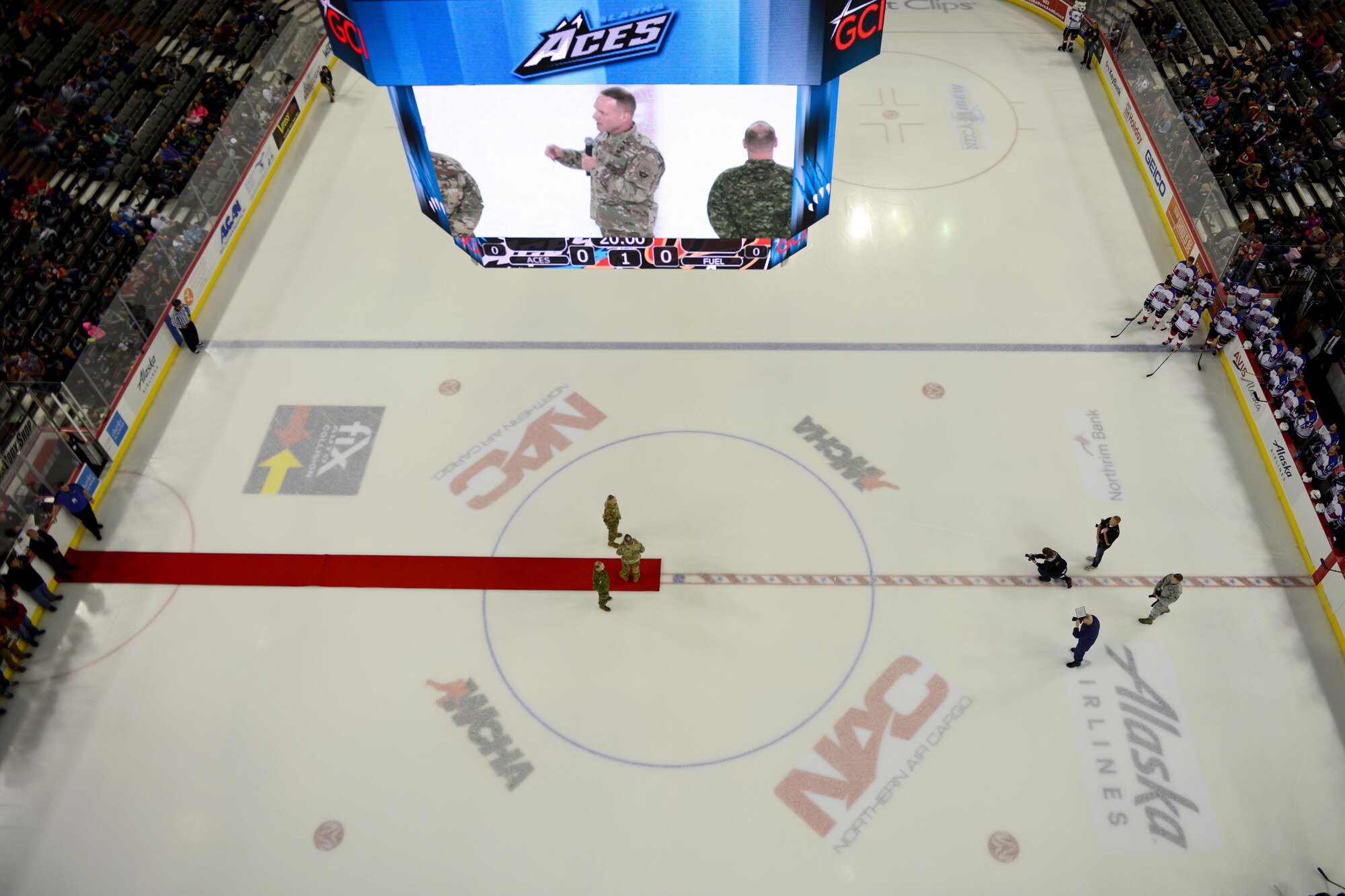Army Maj. Gen. Bryan Owens, U.S. Army Alaska commander, talks to attendees at the Alaska Aces military appreciation game at Sullivan Arena in Anchorage, Alaska, Nov. 11, 2016. The Alaska Aces honored veterans for their service with a military appreciation weekend Nov. 11 and 12. 