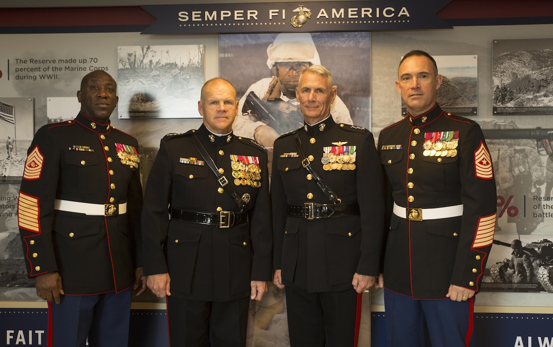 Sgt. Maj. Ronald L. Green, sergeant major of the Marine Corps, Gen. Robert B. Neller, commandant of the Marine Corps, Lt. Gen. Rex C. McMillian, commander of Marine Forces Reserve and Marine Forces North, and Sgt. Maj. Patrick L. Kimble, sergeant major of MARFORRES and MARFORNORTH, pose for a photo at a ribbon-cutting ceremony for the official unveiling of the Marine Corps Reserve Centennial wall display at the Pentagon, Arlington, Va., Nov. 9, 2016. The exhibit was installed at the Pentagon in conjunction with the 100th anniversary of the Marine Corps Reserve, which was celebrated Aug. 29, 2016. For more information on the history and heritage of the Marine Corps Reserve as well as current Marine stories and upcoming Centennial events, please visit www.marines.mil/usmcr100. (U.S. Marine Corps photo by Sgt. Ian Leones)