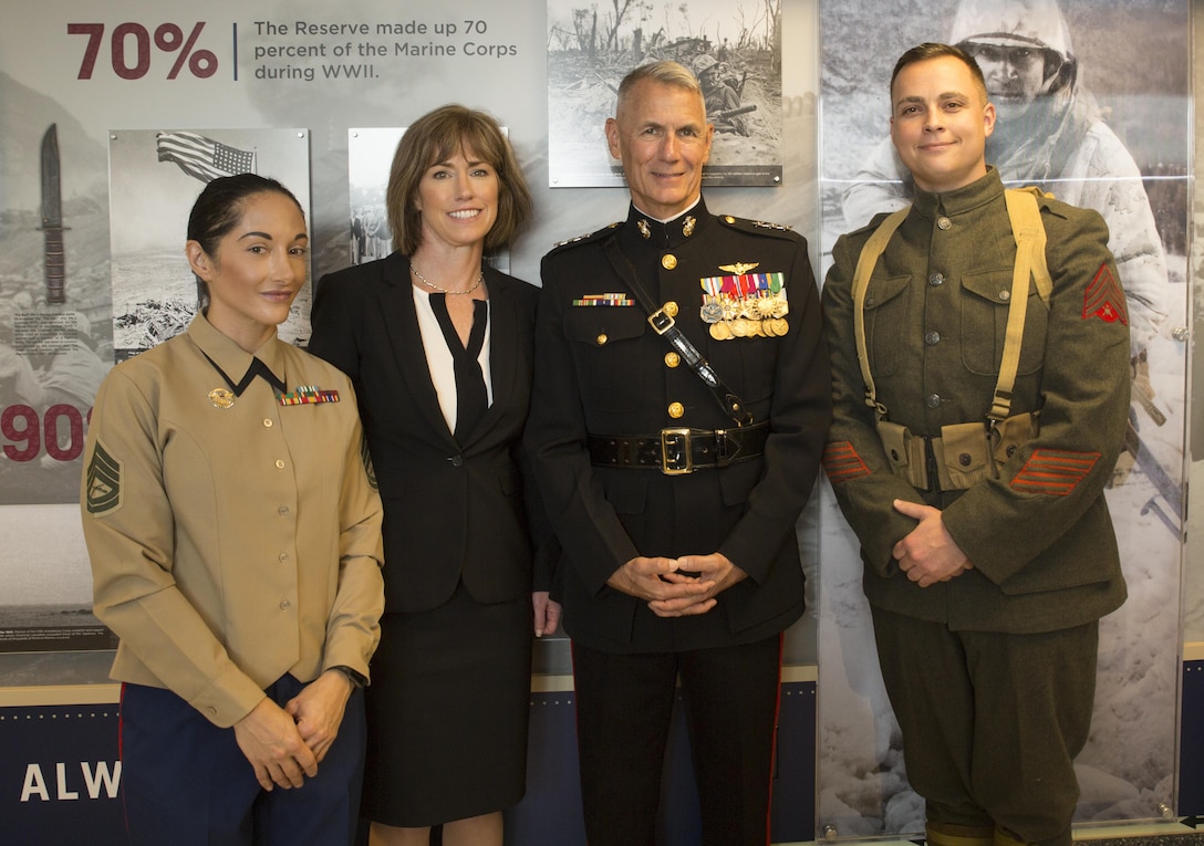 Lt. Gen. Rex C. McMillian, commander of Marine Forces Reserve and Marine Forces North, stands with the Marine Corps Reserve Centennial team in front of the Marine Corps Reserve Centennial wall display at the Pentagon, Arlington, Va., Nov. 9, 2016. The Centennial team did the leg work to design, research and coordinate the installation of the display in the Pentagon in conjunction with the 100th anniversary of the Marine Corps Reserve, which was celebrated Aug. 29, 2016. For more information on the history and heritage of the Marine Corps Reserve as well as current Marine stories and upcoming Centennial events, please visit www.marines.mil/usmcr100. (U.S. Marine Corps photo by Sgt. Ian Leones)