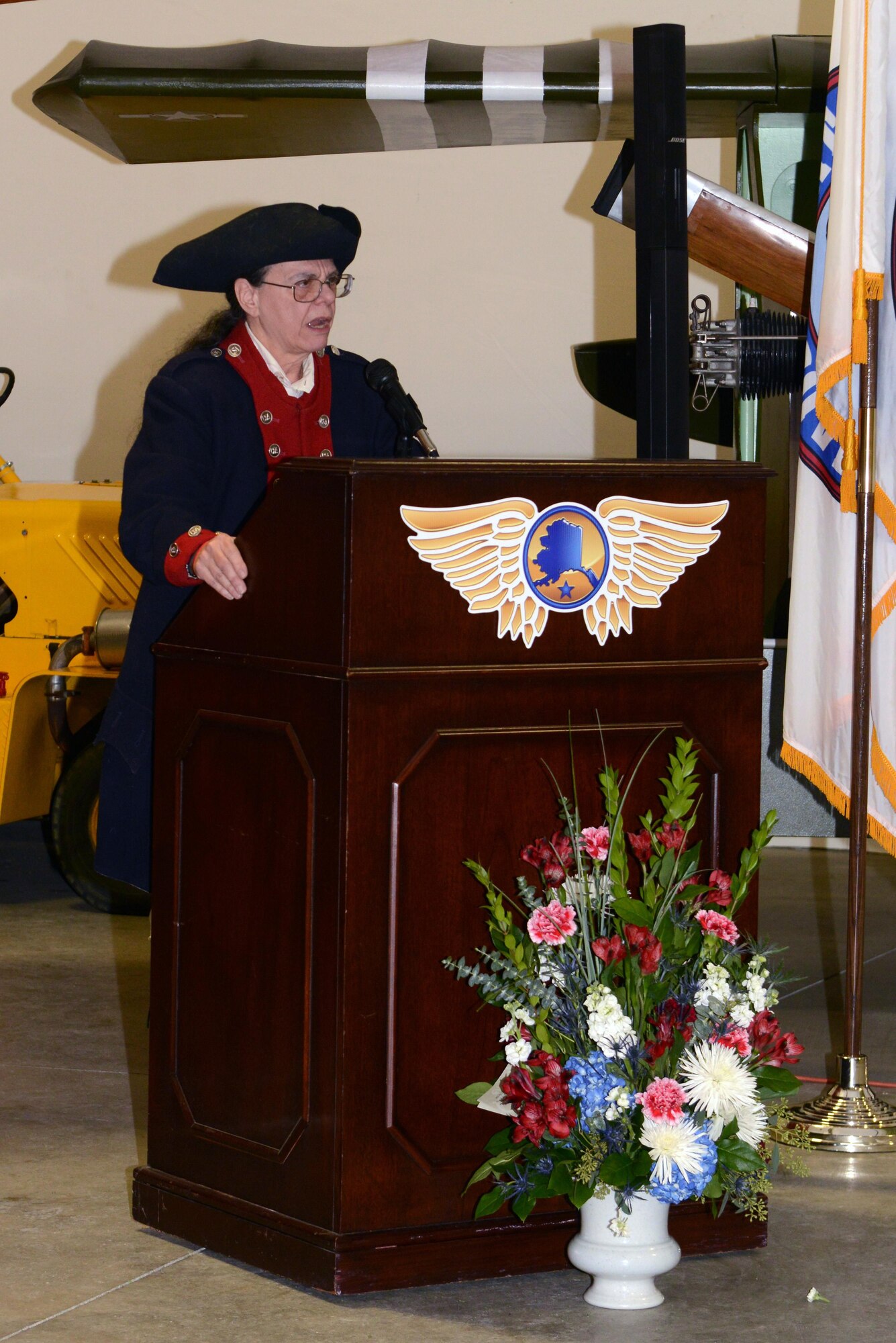 Guest speaker Suellyn Wright Novak, retired Air Force colonel and Alaska Veterans Museum president, dressed up as the first officially documented woman to fight in an American war, Deborah Sampson also known as Robert Shurtlieff who enlisted in 1781, as part of the Women Veterans Recognition ceremony hosted by the Women Veterans Program at the Alaska Aviation Museum, Anchorage, Nov. 9, 2016. She spoke about the history behind the women who served in the military during the Revolutionary and Civil wars openly as nurses and aides – and undercover as men – on the battlefields.