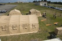 The 31st and 33rd Rescue Squadrons set up a mobile command center during Exercise Keen Sword 17 Nov. 8, 2016, at Kadena Air Base, Japan. Rescue Squadrons need to be able to set up a command center anywhere in the world in order to respond to rescue situations. (U.S. Air Force photo by Airman 1st Class Corey M. Pettis)