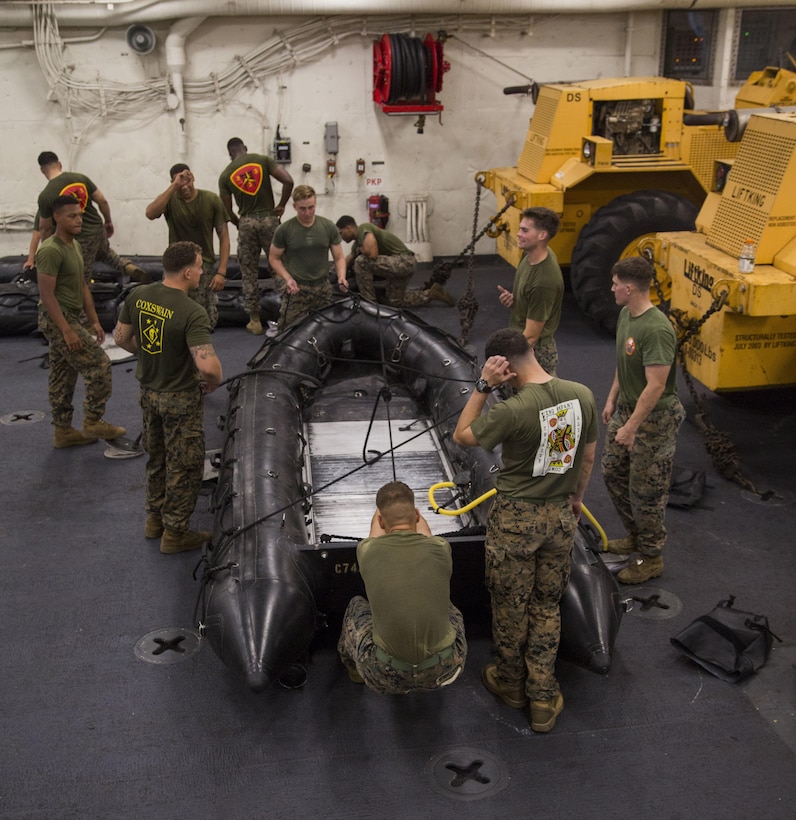 Marines prepare combat rubber reconnaissance crafts (CRRC) for boat raids during Blue Chromite 2017 in Okinawa, Japan, October 29, 2016. Blue Chromite is a large-scale amphibious mission rehearsal which strengthens the Navy-Marine Corps expeditionary, amphibious rapid response capabilities based in Okinawa and the greater Indo-Asia-Pacific region. Pacific region Marines are assigned to 3rd Battalion, 3rd Marine Regiment which is forward deployed from Kaneohe Bay, Hawaii, to 3rd Marine Division, based in Okinawa, Japan. (U.S. Marine Corps photo by Lance Cpl. Jesus McCloud)
