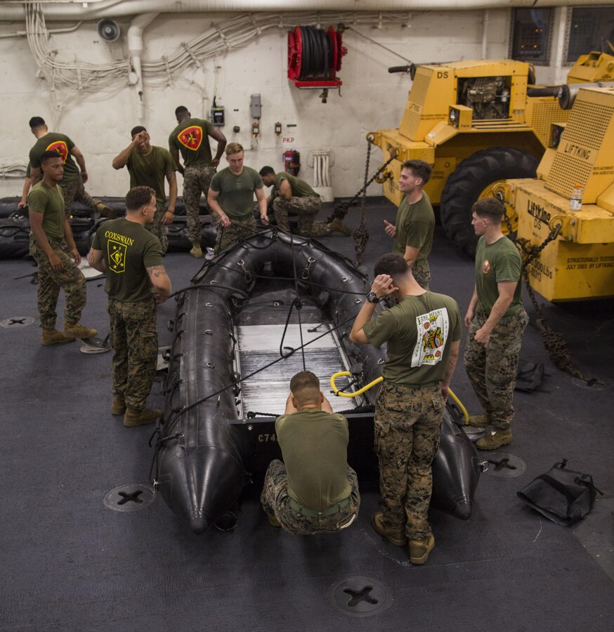 Marines prepare combat rubber reconnaissance crafts (CRRC) for boat raids during Blue Chromite 2017 in Okinawa, Japan, October 29, 2016. Blue Chromite is a large-scale amphibious mission rehearsal which strengthens the Navy-Marine Corps expeditionary, amphibious rapid response capabilities based in Okinawa and the greater Indo-Asia-Pacific region. Pacific region Marines are assigned to 3rd Battalion, 3rd Marine Regiment which is forward deployed from Kaneohe Bay, Hawaii, to 3rd Marine Division, based in Okinawa, Japan. (U.S. Marine Corps photo by Lance Cpl. Jesus McCloud)